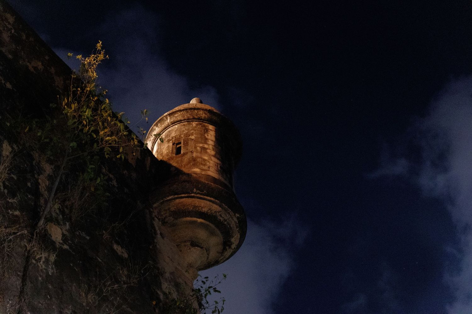 A series of lighthouse photos at different times of day showing dramatic coastal scenery and architecture.