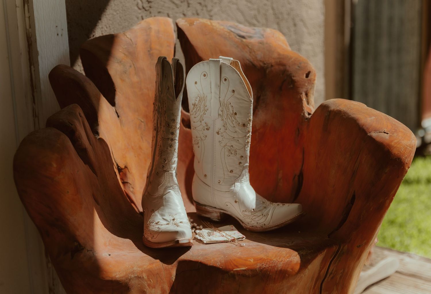 A series of rusted metal sculptures showing abstract curved and twisted forms arranged in a row.