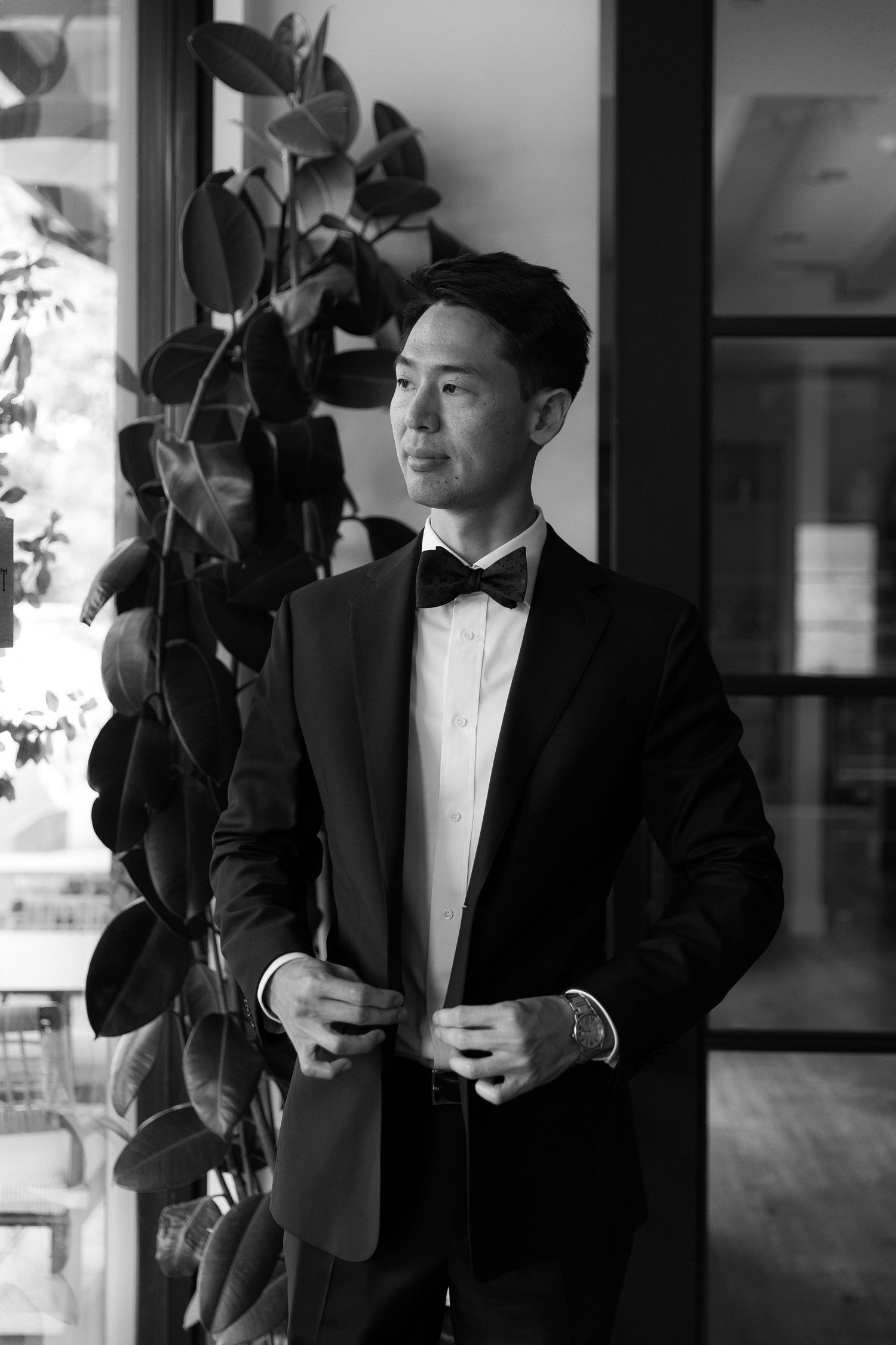 A black and white series of photos showing people in formal attire holding drinks at an elegant event.