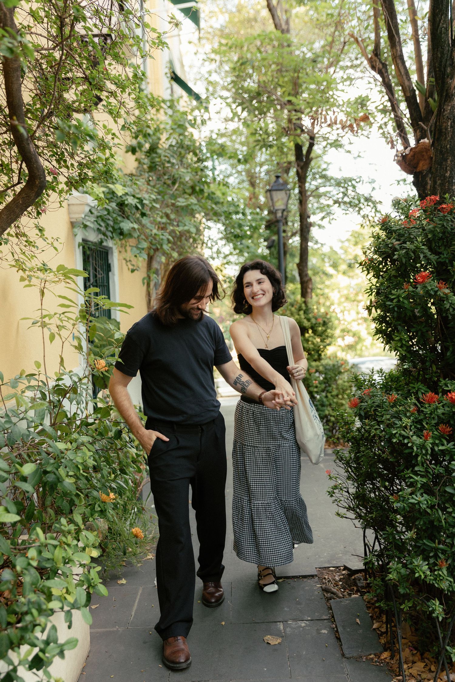 Alanis Colina & Kef Matthew walking around Old San Juan for their couples shoot by Beloved Captures a Puerto Rico Wedding Photographer.