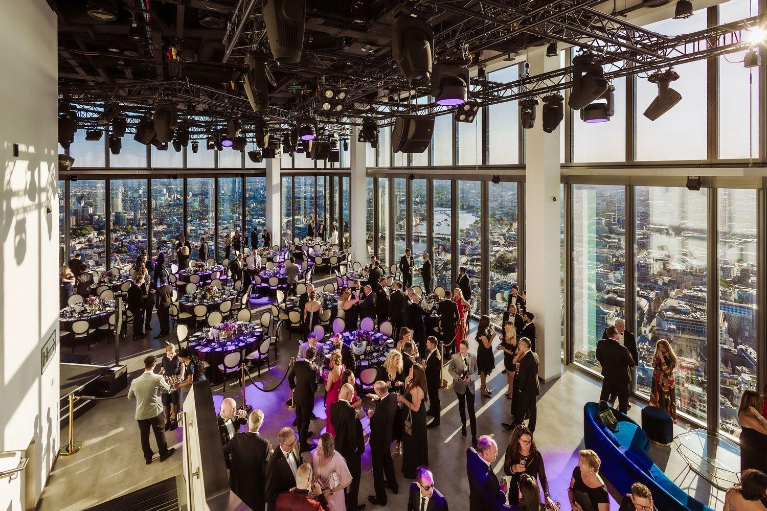 horizon 22 bishopsgate London event gala Upscale rooftop event space with floor-to-ceiling windows, city skyline views, and guests mingling.