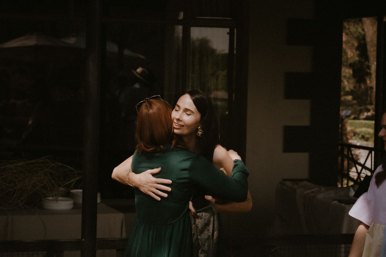 Wedding guests hugging each other
