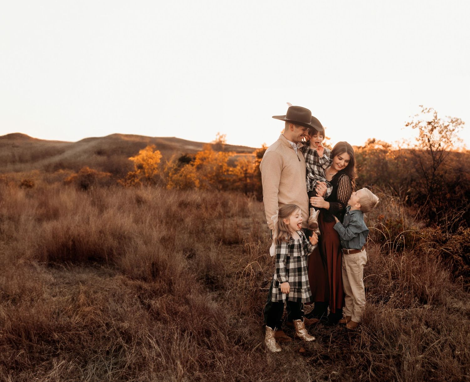 Wichita Wildlife Mountains Refuge Paul Family Photoshoot Session, siblings, mother father, fields, mountain, beautiful skies