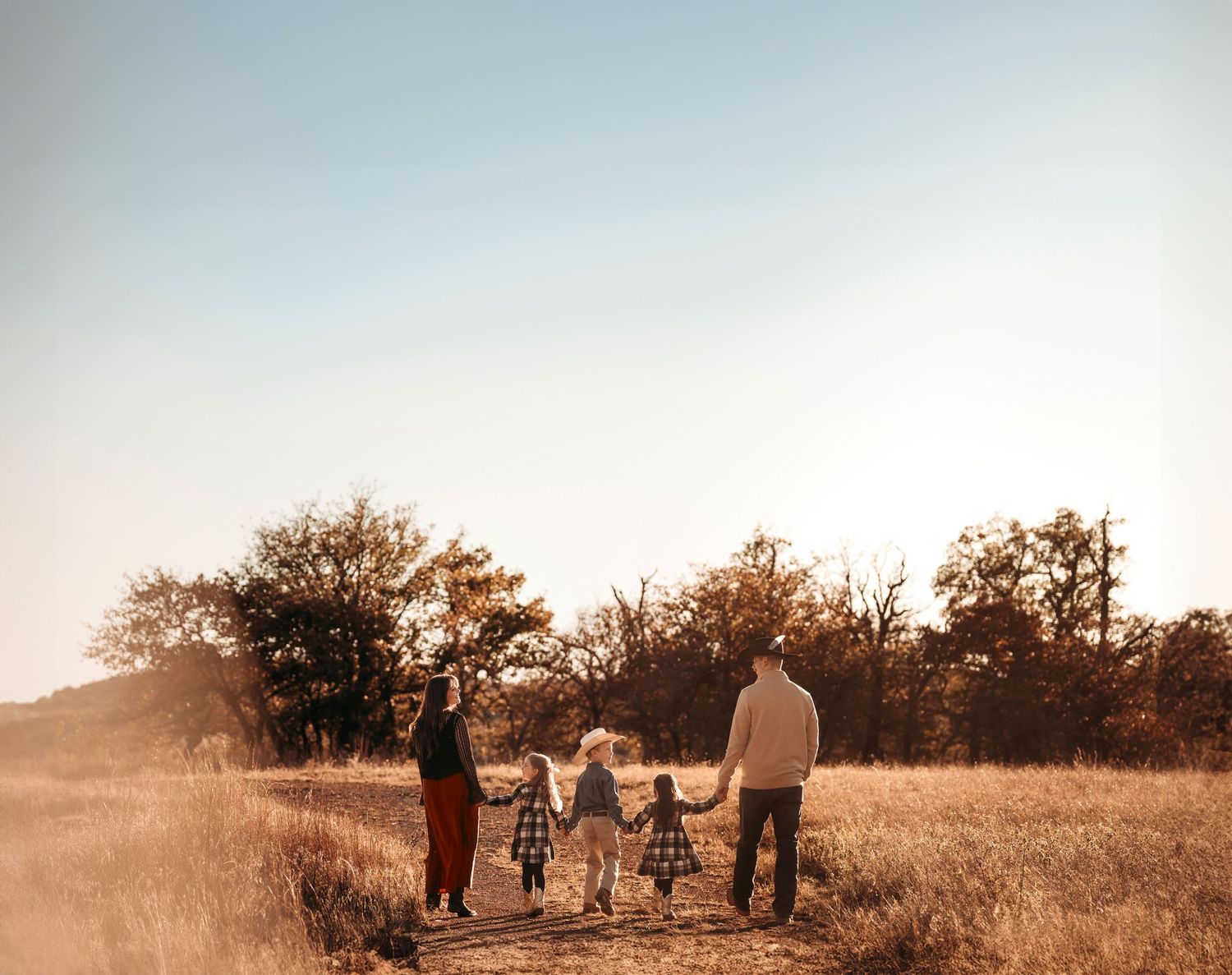 Wichita Wildlife Mountains Refuge Paul Family Photoshoot Session, siblings, mother father, fields, mountain, beautiful skies