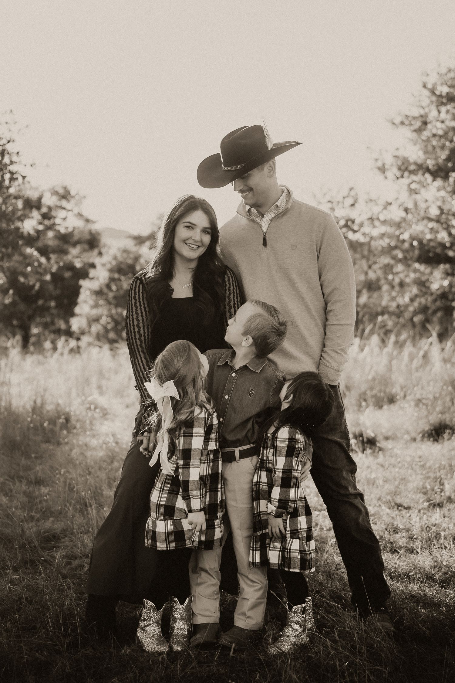 Wichita Wildlife Mountains Refuge Paul Family Photoshoot Session, siblings, mother father, fields, mountain, beautiful skies