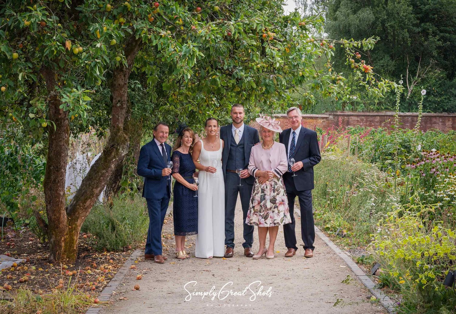 Hampton Manor wedding photographer capturing couple portraits in a victorian walled garden.