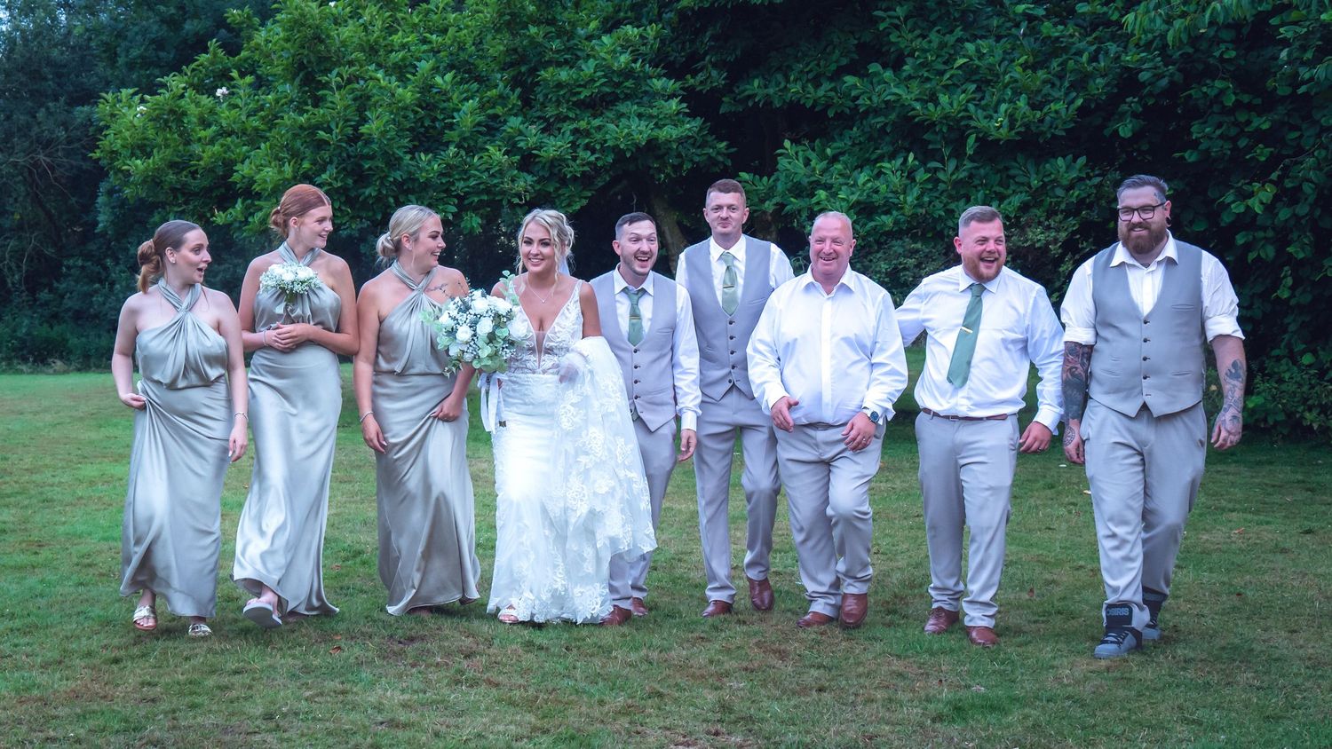 Rothley Court wedding photographer captures the bride and groom with their bridesmaids and groomsmen.