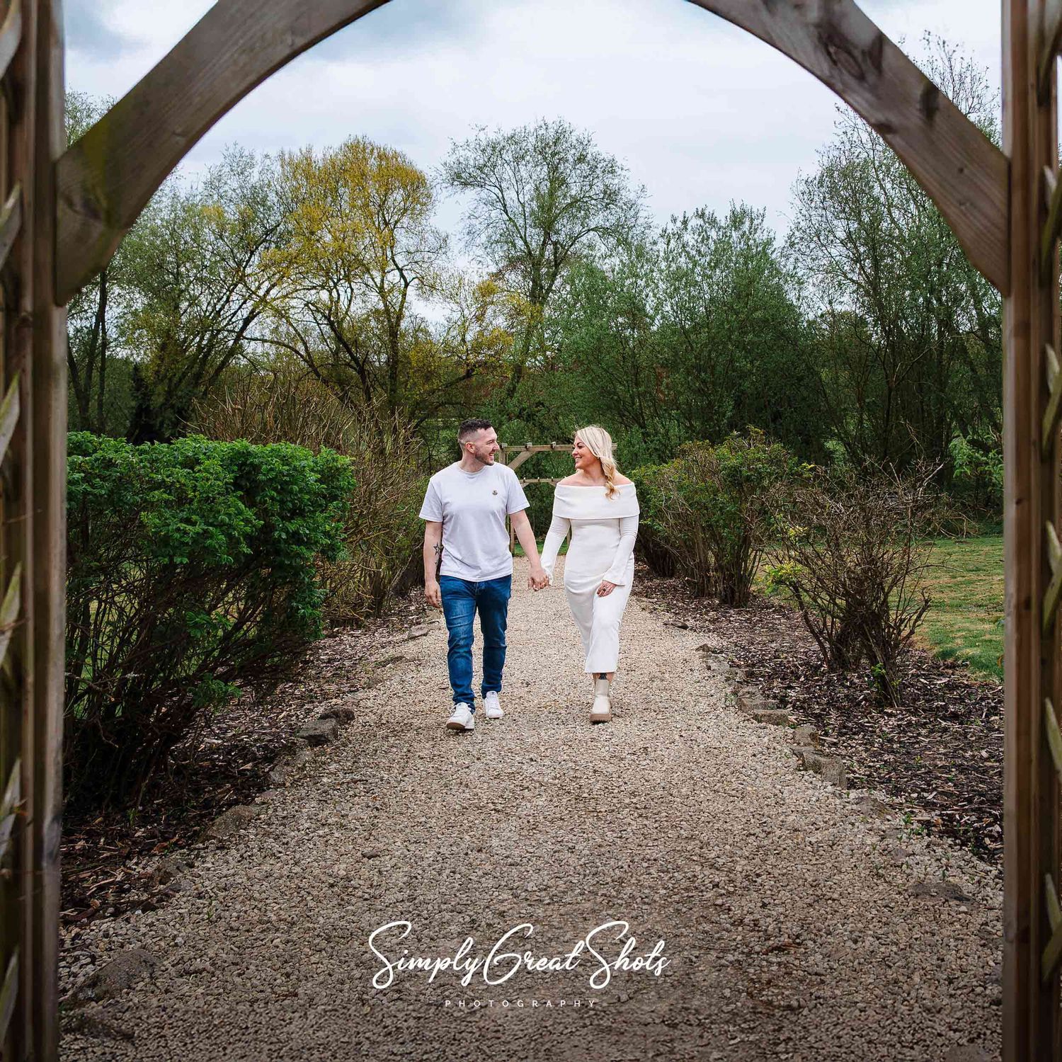 Rothley Court wedding photographer captures an engaged couple walking towards the camera on their pre-wedding photoshoot.