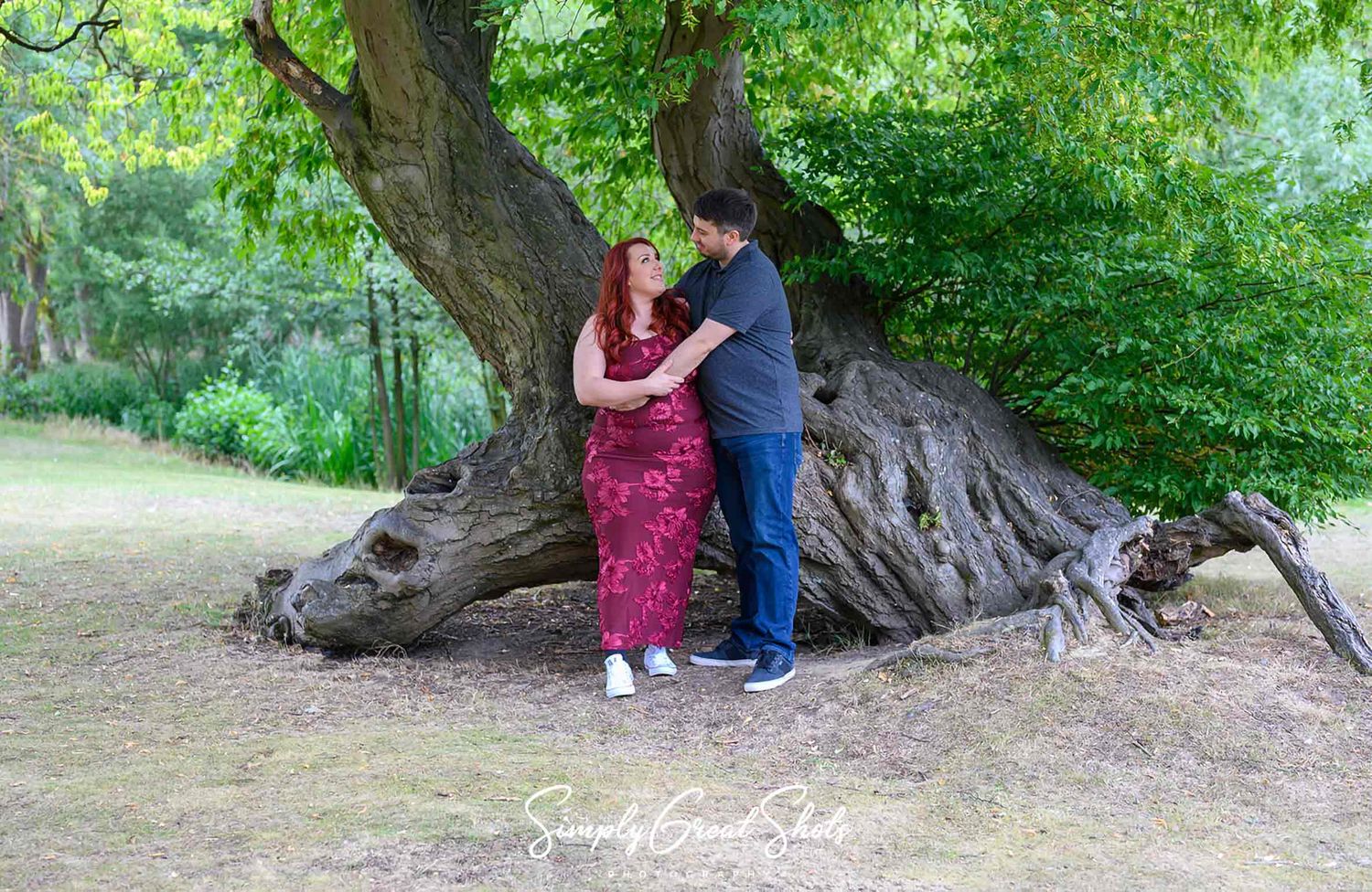 Eastwood Hall wedding photographer captures an engaged couple cuddling at a pre-wedding photoshoot at their wedding venue.