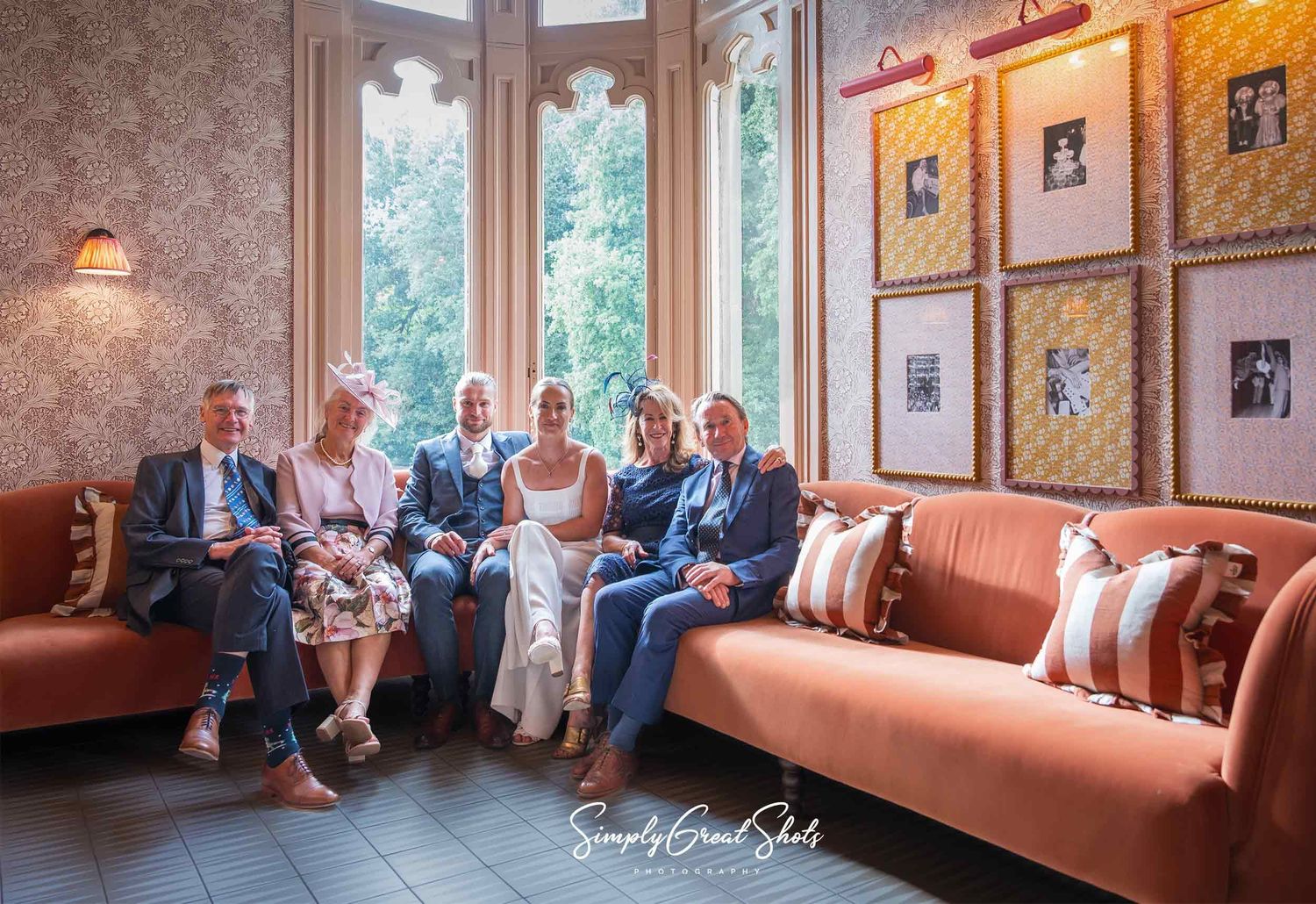 Hampton Manor wedding photographer captures some of the wedding party within grand interior spaces