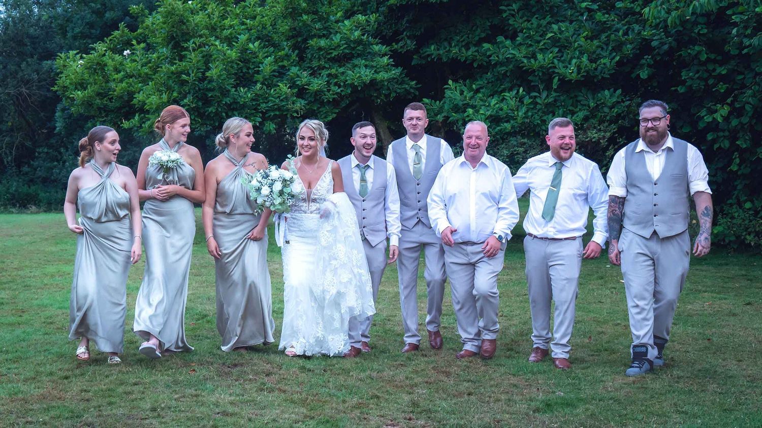 Rothley Court wedding photographer captures the bride and groom with their bridesmaids and groomsmen.