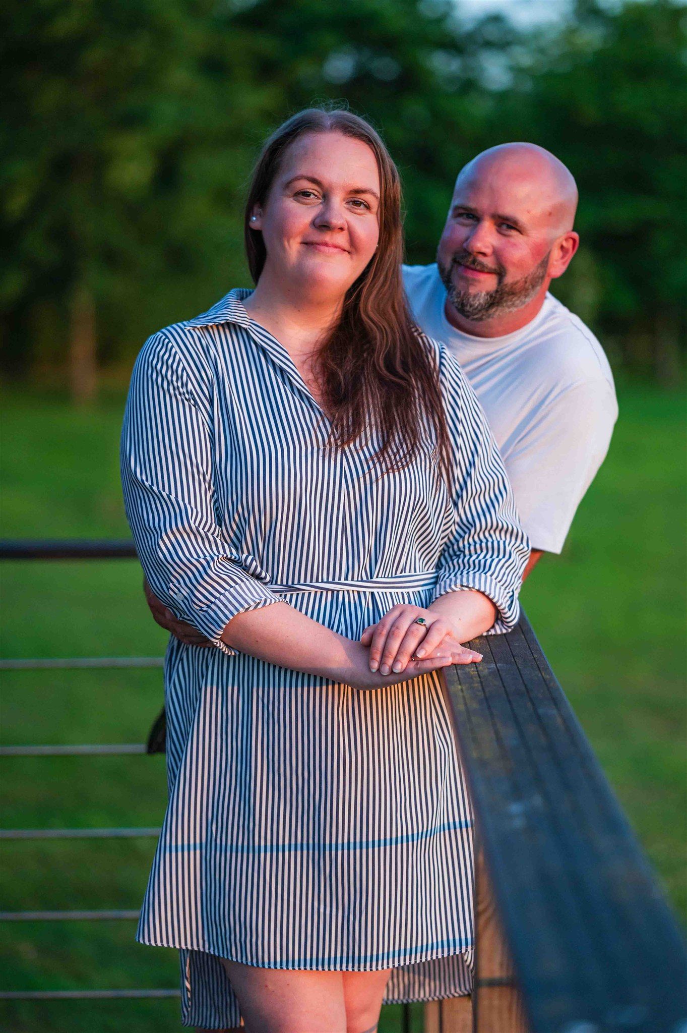 Warwickshire wedding photographer captures a couple posing during the golden hour at their pre-wedding photoshoot.