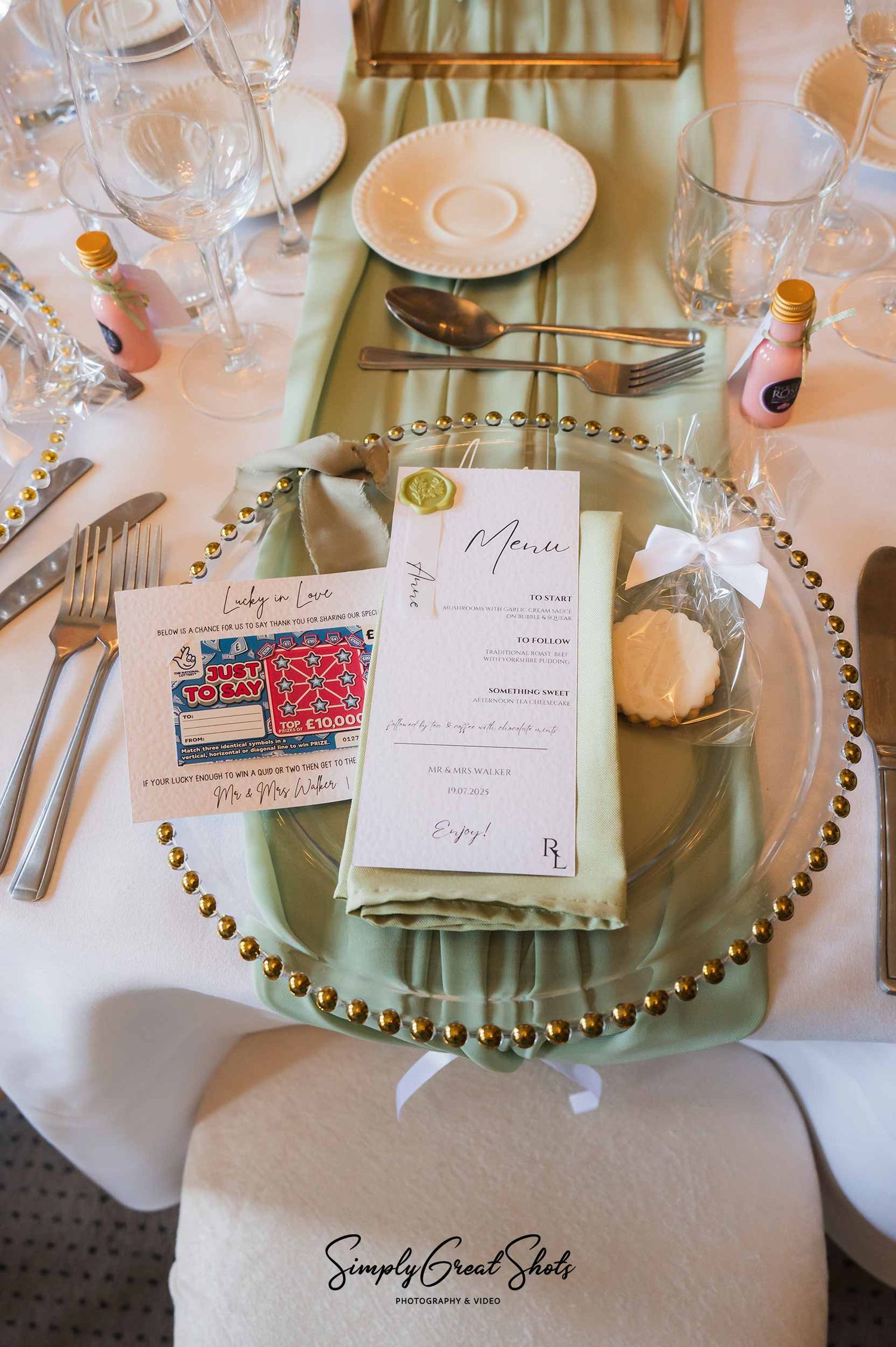 Wedding place setting with menu and favours in the Templar Suite at Rothley Court.
