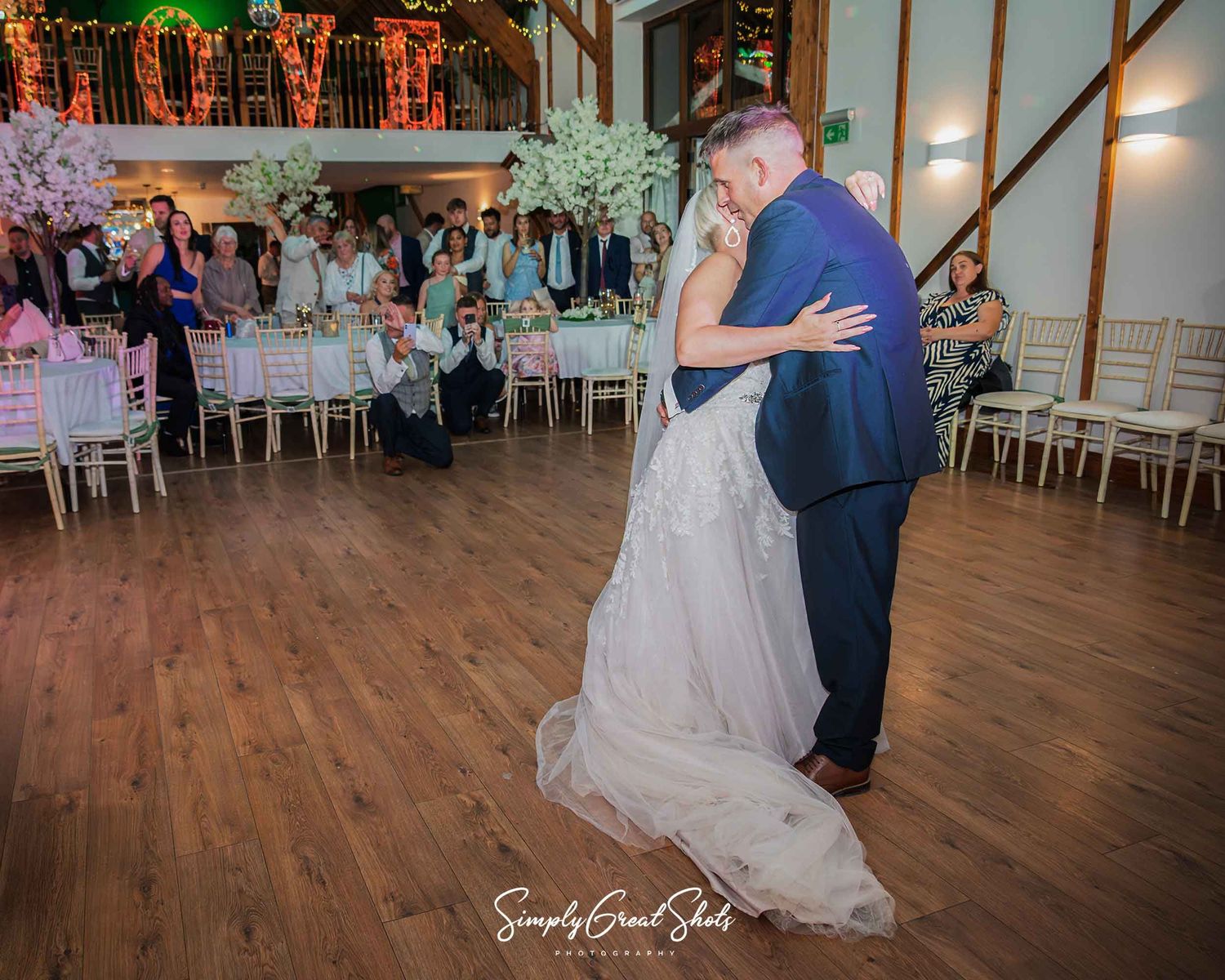 Winters Tale Country Barn wedding photographer photographs the newlyweds first dance.