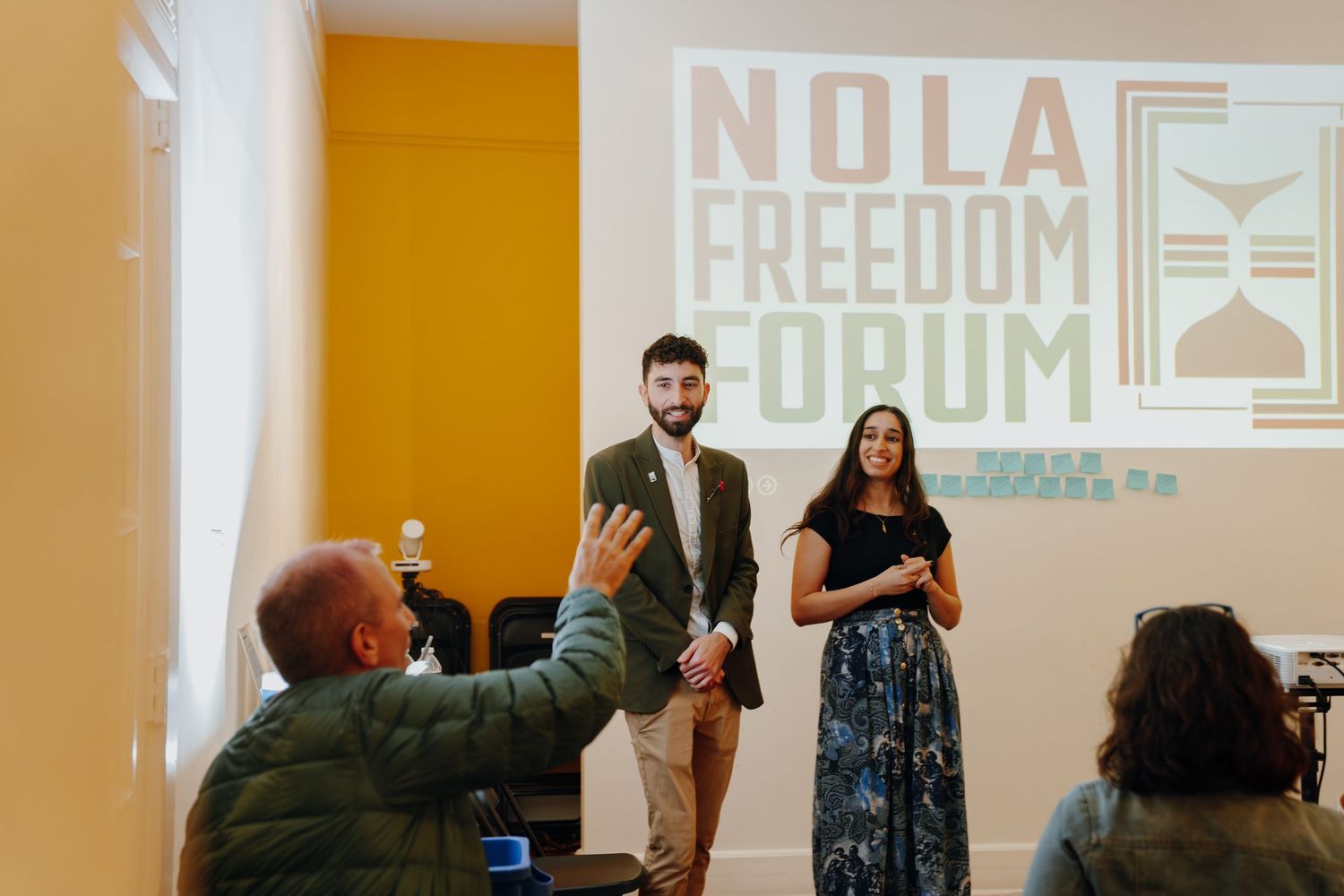 Presenters speak to audience at the NOLA Freedom Forum event.