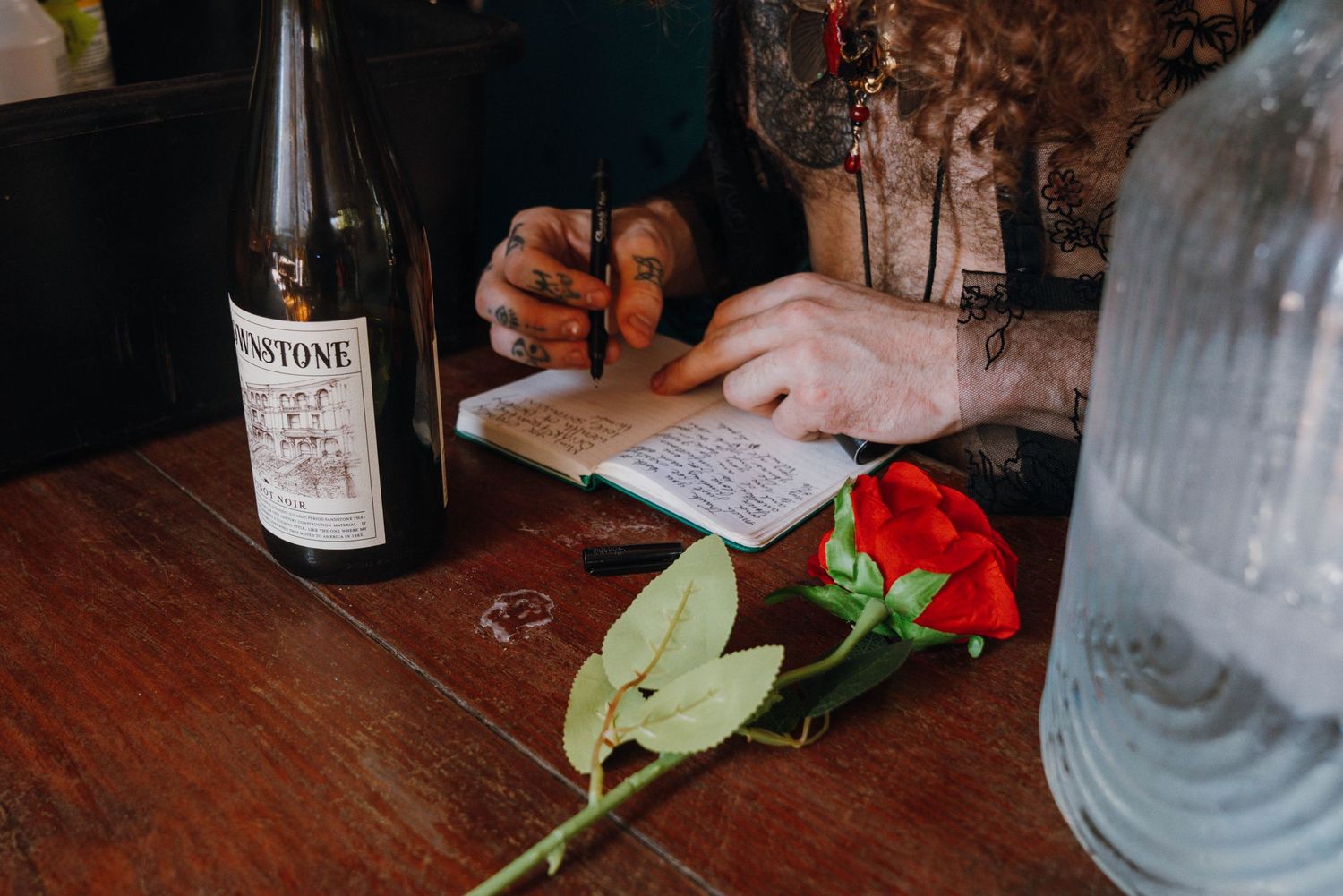 wedding vows and handwritten letters on wedding day at a dive bar
