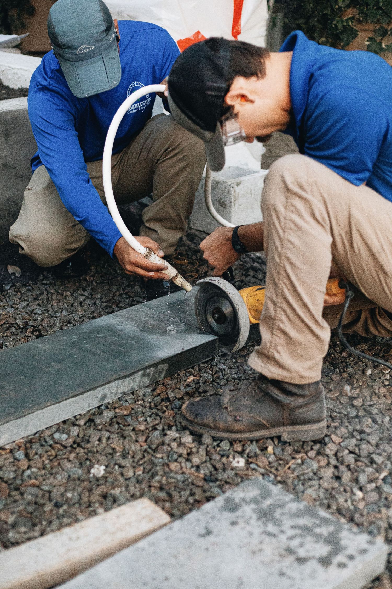 Cutting some stone for a hardscape design.