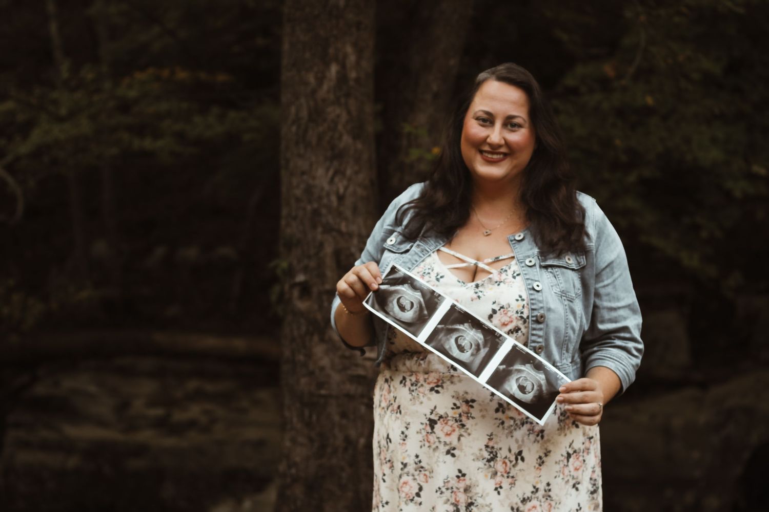 Series of pregnancy announcement photos showing ultrasound images outdoors.
