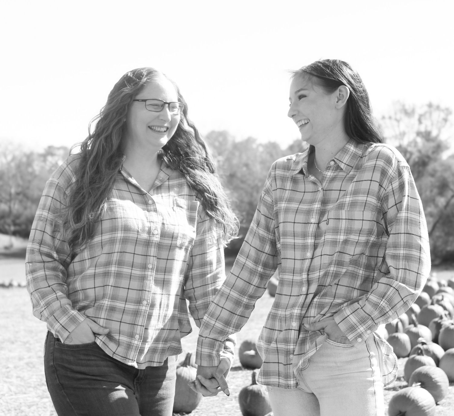 Black and white portrait series showing joyful moments between family members.