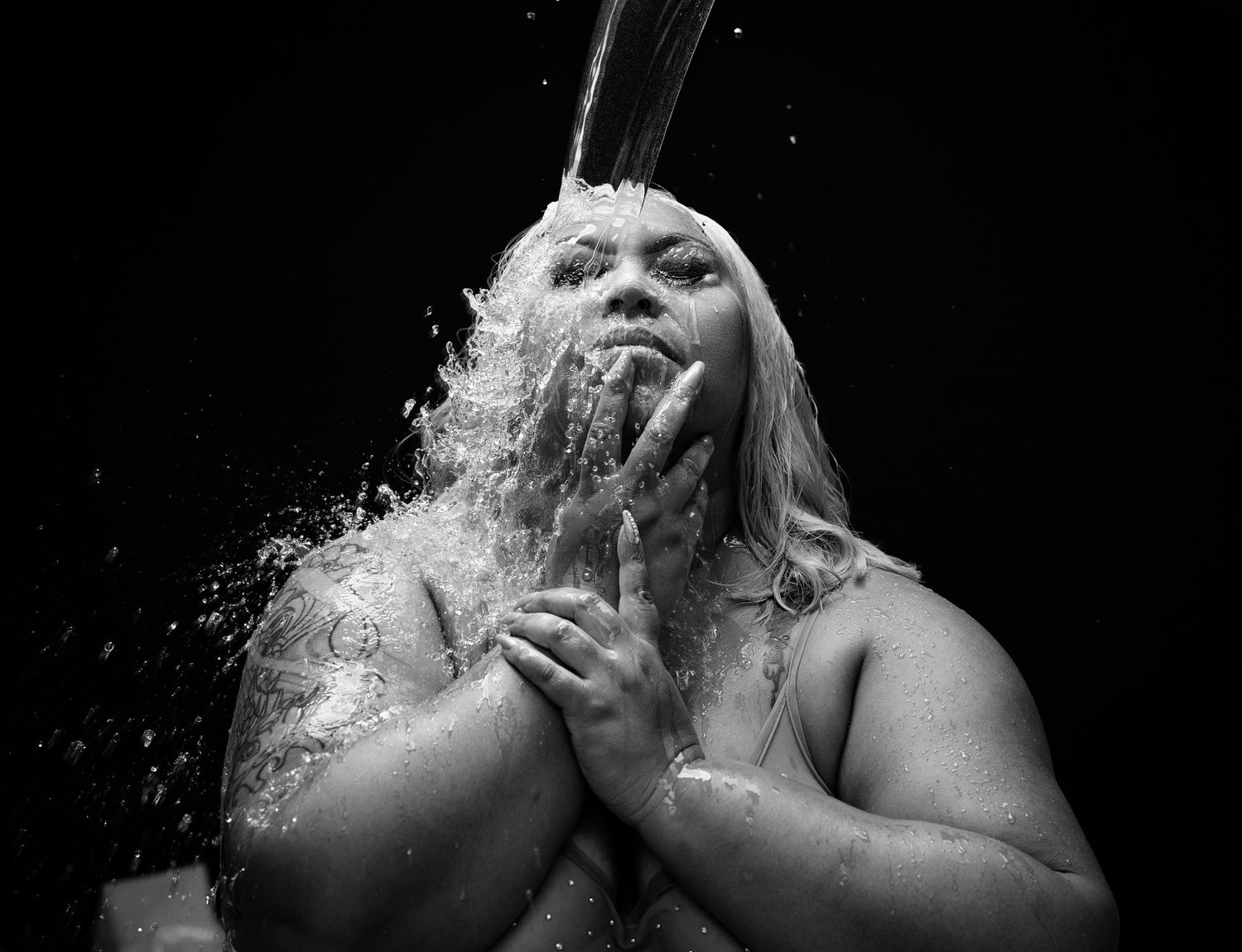 A black and white photo sequence shows flour being thrown at someone's face creating a dramatic powder explosion effect.