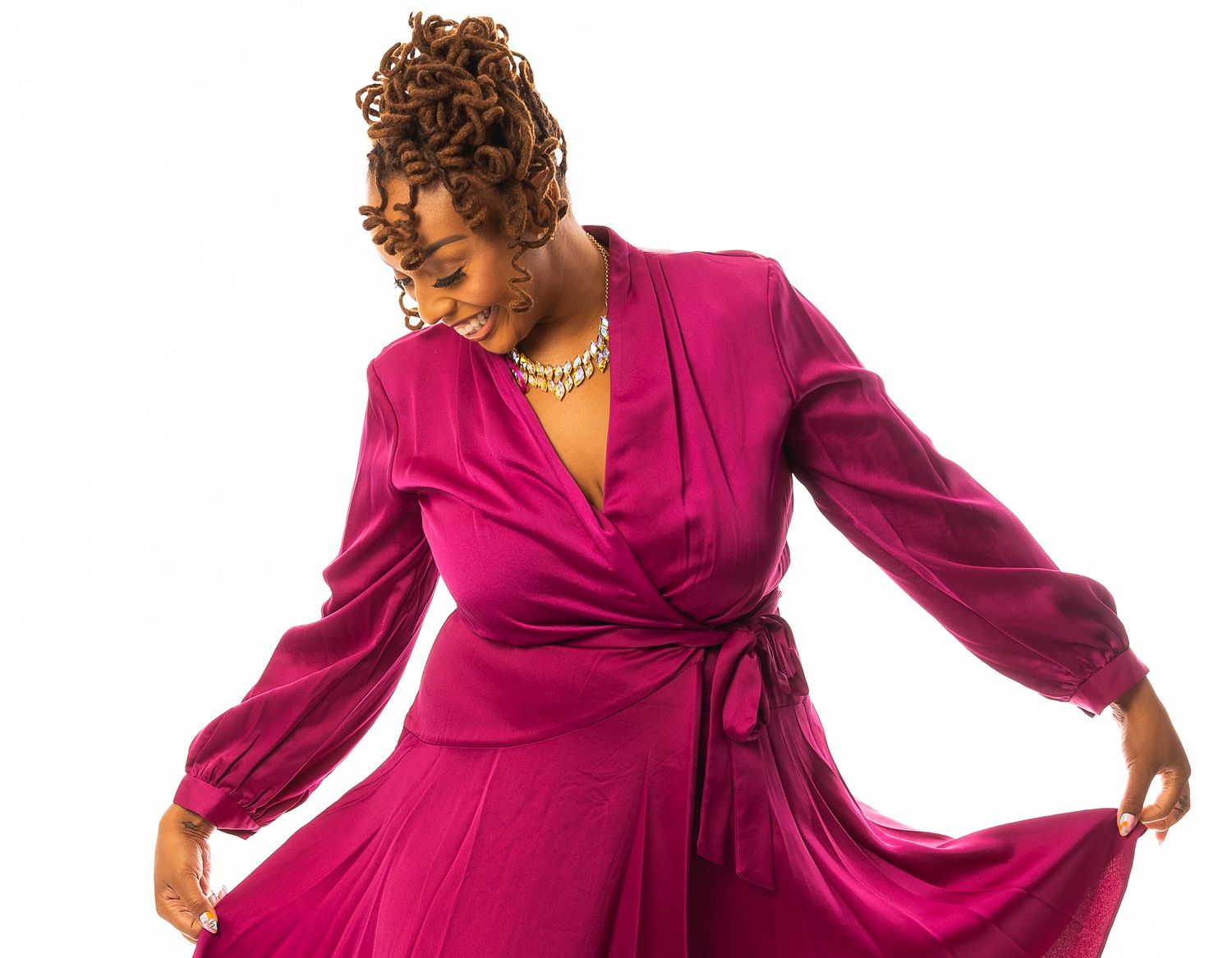 A sequence of dance poses in a flowing magenta wrap dress showing graceful movement and expression.