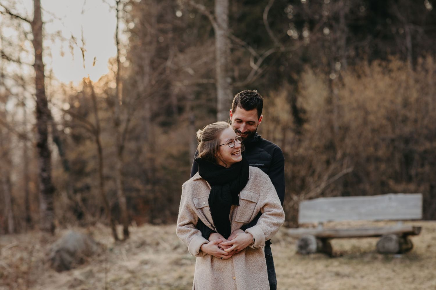 Intimate outdoor portrait of couple embracing on an autumn day.