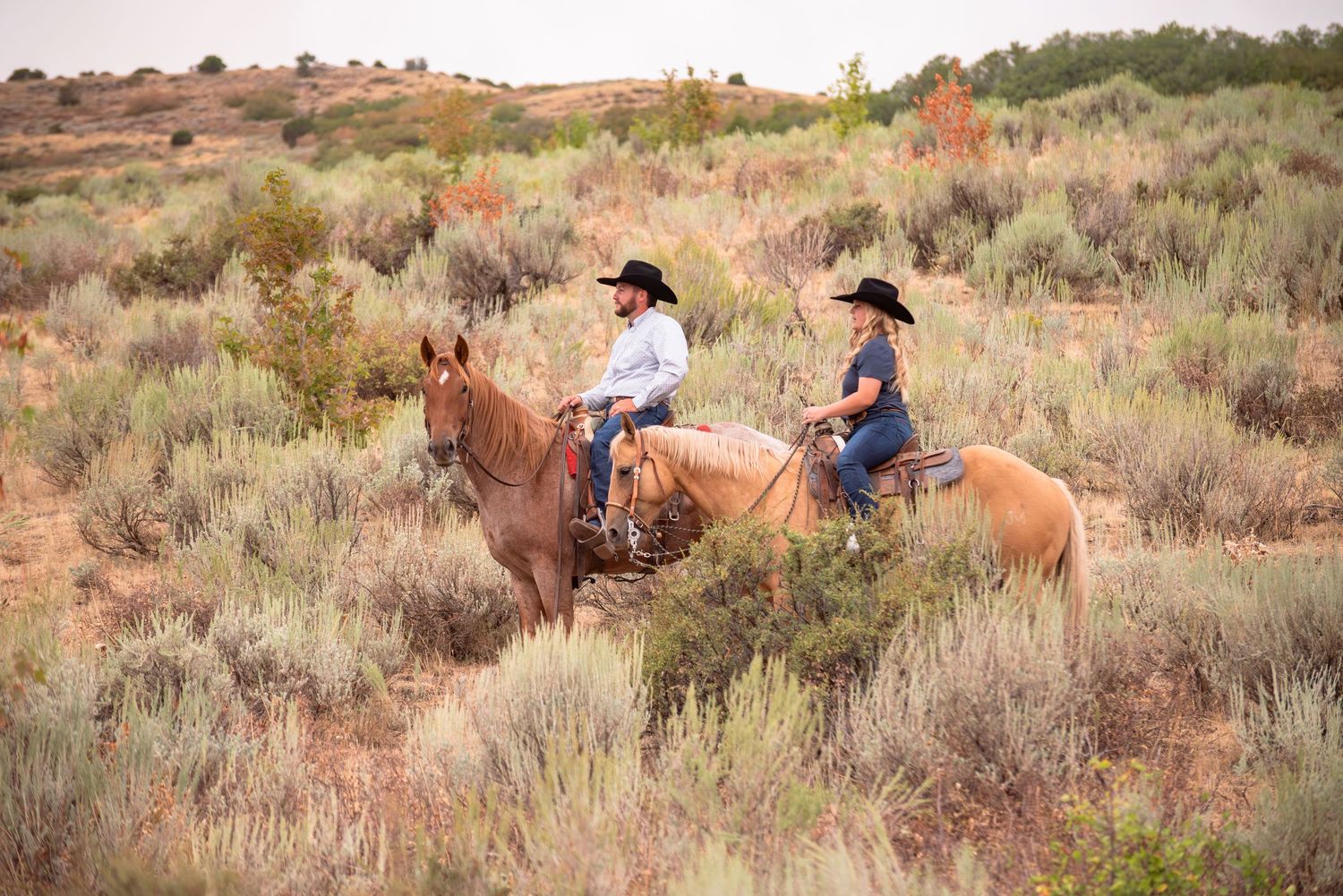 Couple photography western cowboy on their horses