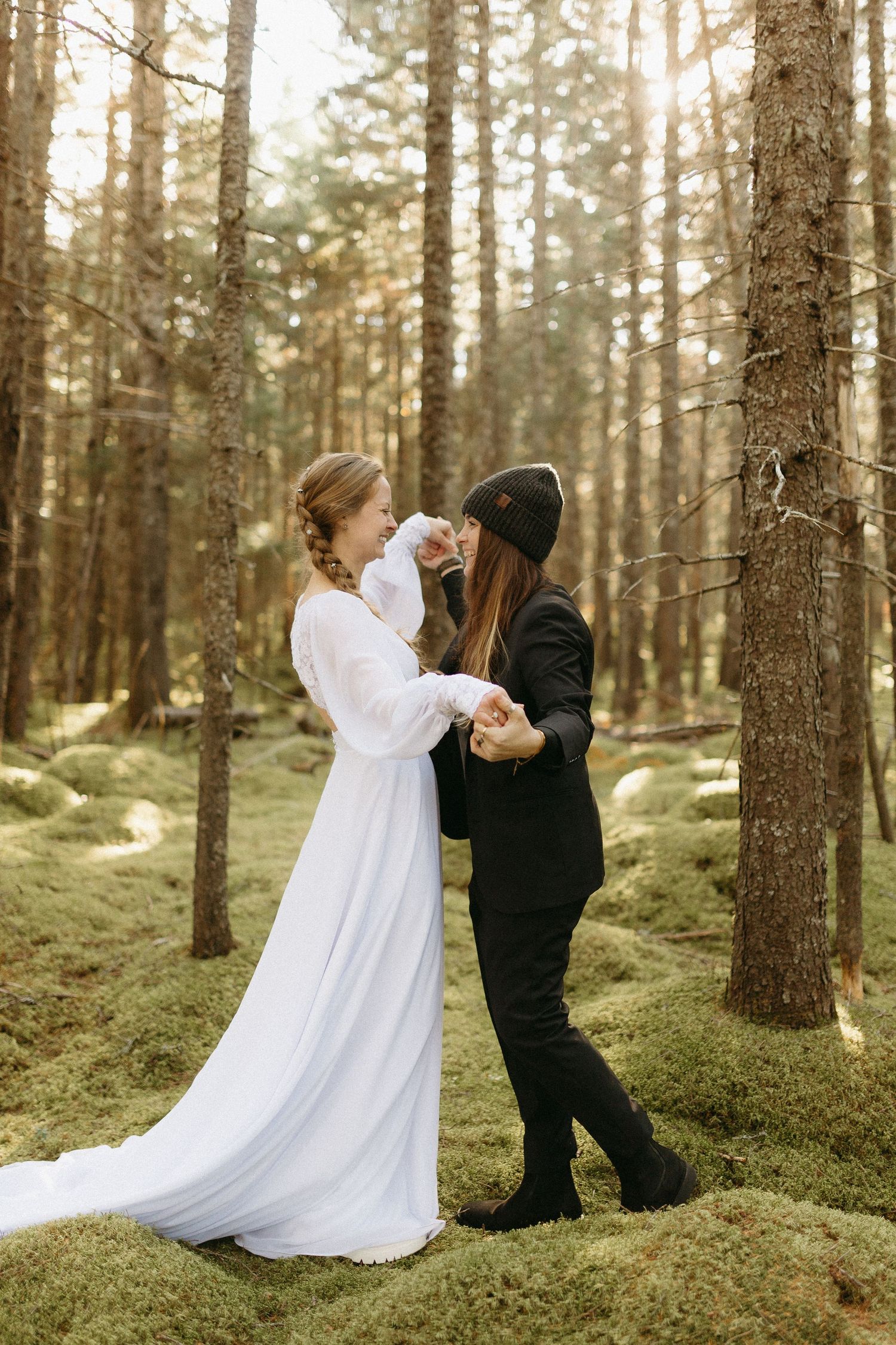 chelle wootten photography halifax nova scotia wedding and family portrait photographer two brides dancing in the woods on their wedding day
