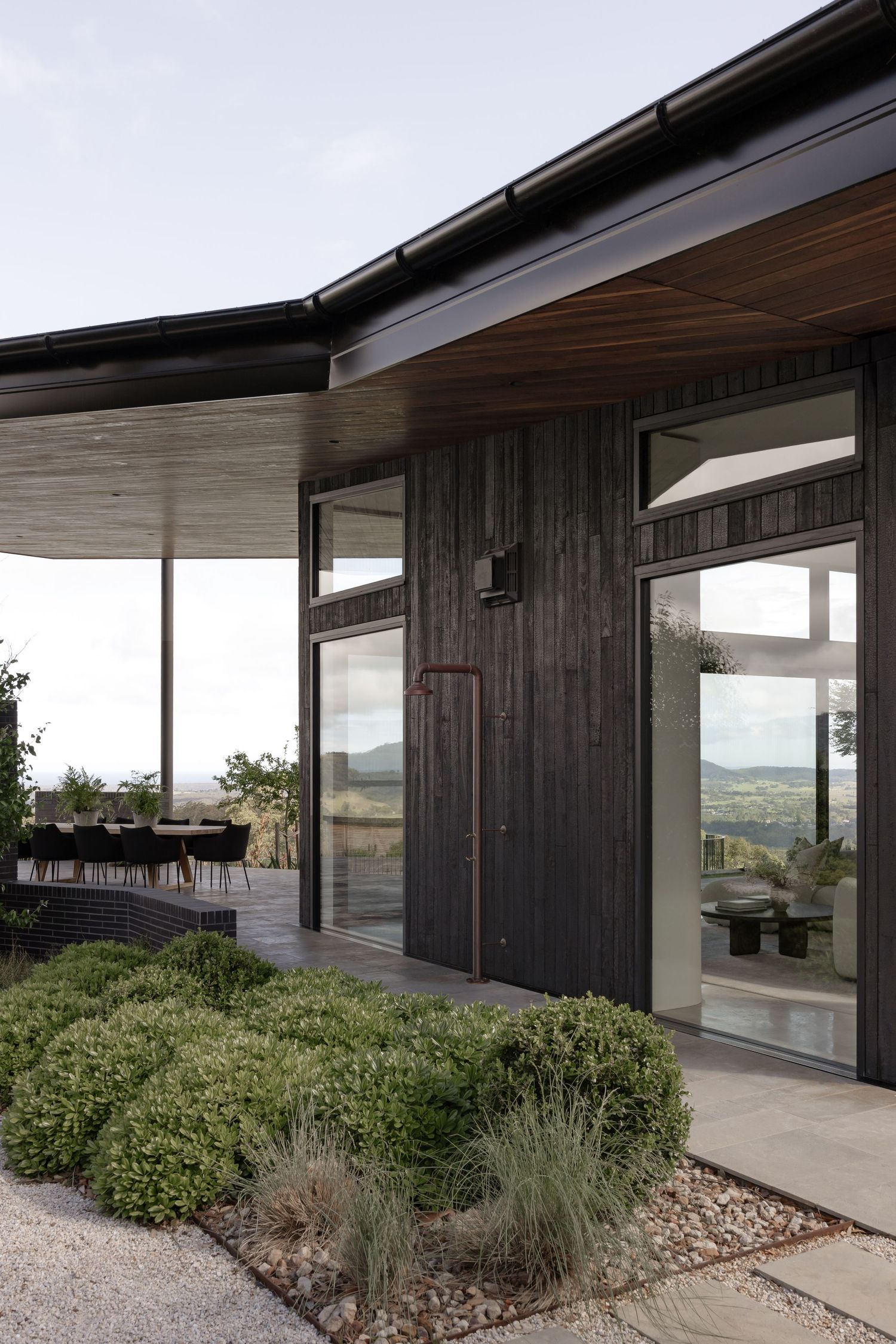 Dark featured luxury home with landscaping in Berry, NSW.