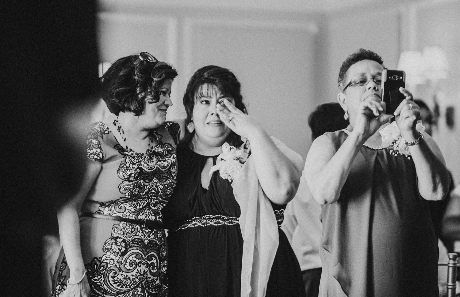 Mother of the bride crying emotional at wedding in black in white at a south carolina wedding
