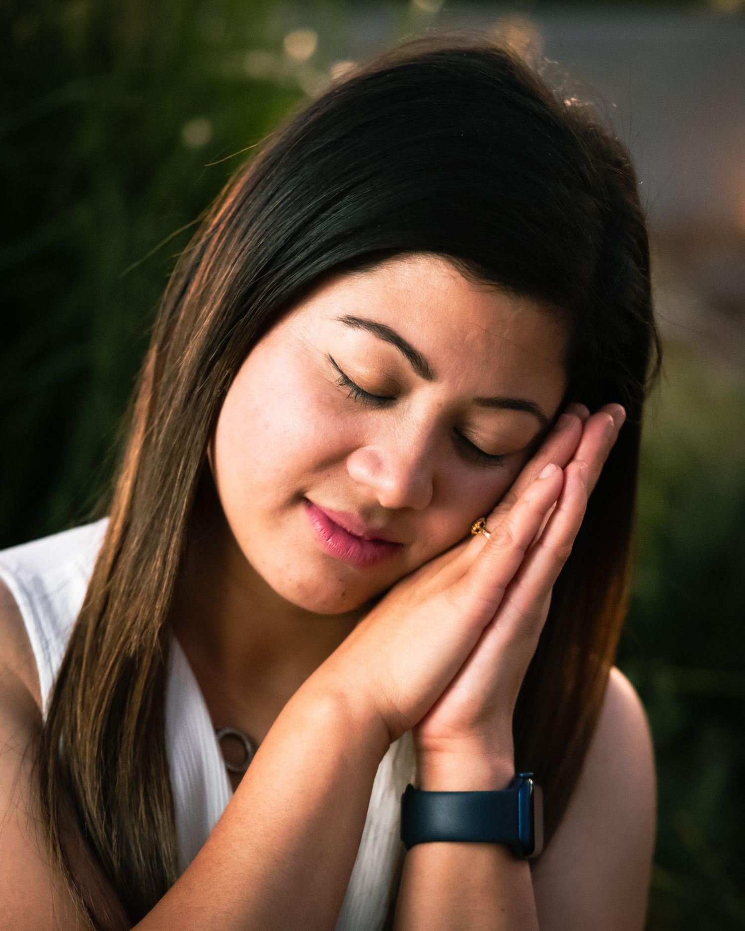 Artistic portrait series showing peaceful expressions in natural lighting.