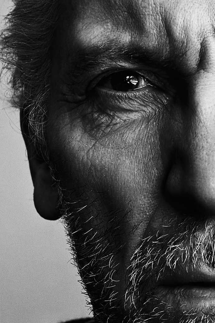 Dramatic black and white extreme close-up portraits focusing on eye and facial details.