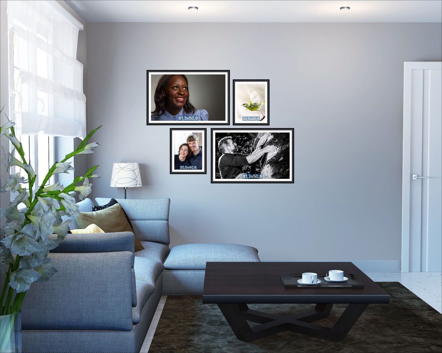 Modern living room with gray sectional sofa, dark wood coffee table, and gallery wall featuring framed photos and artwork.
