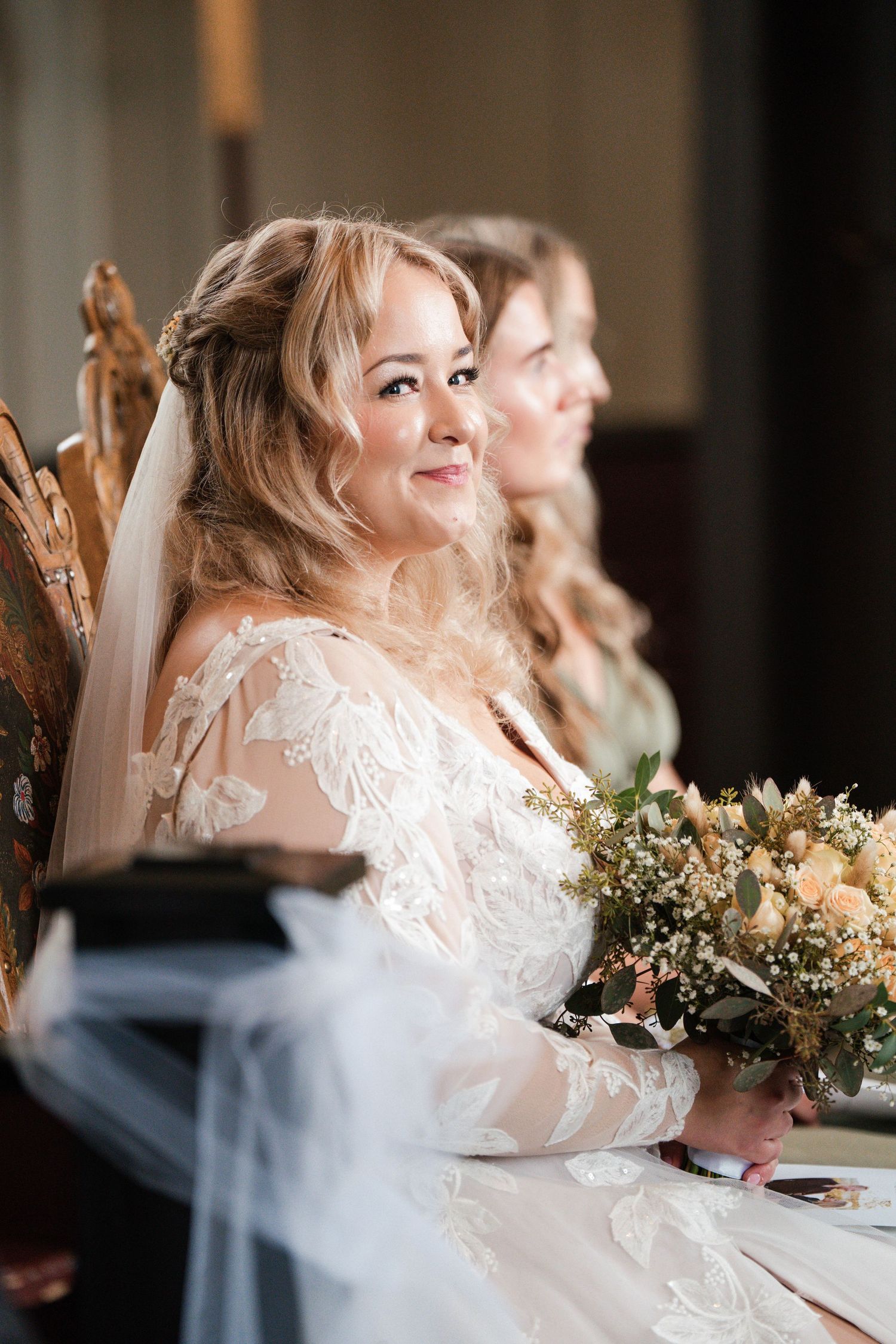 Elegant wedding ceremony scene with delicate lace details and natural light.
