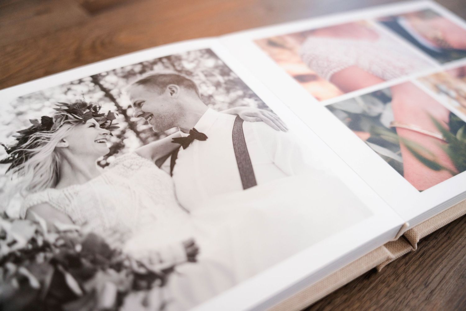 Wedding photo album spread showing artistic black and white photography layout.