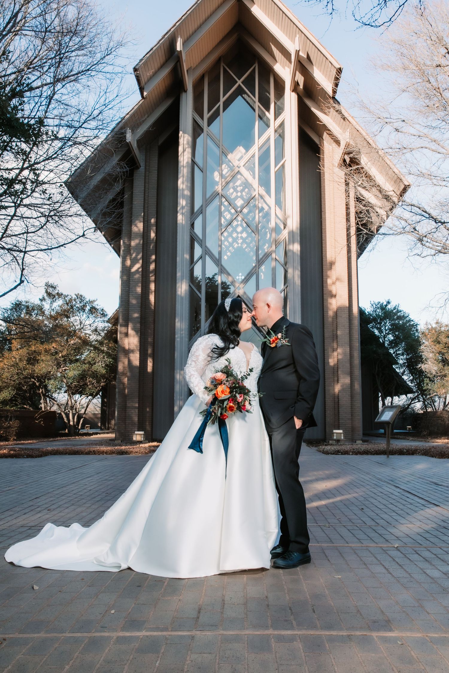Romantic outdoor wedding photoshoot sequence showing five poses of a couple in formal attire near a modern architectural structure.