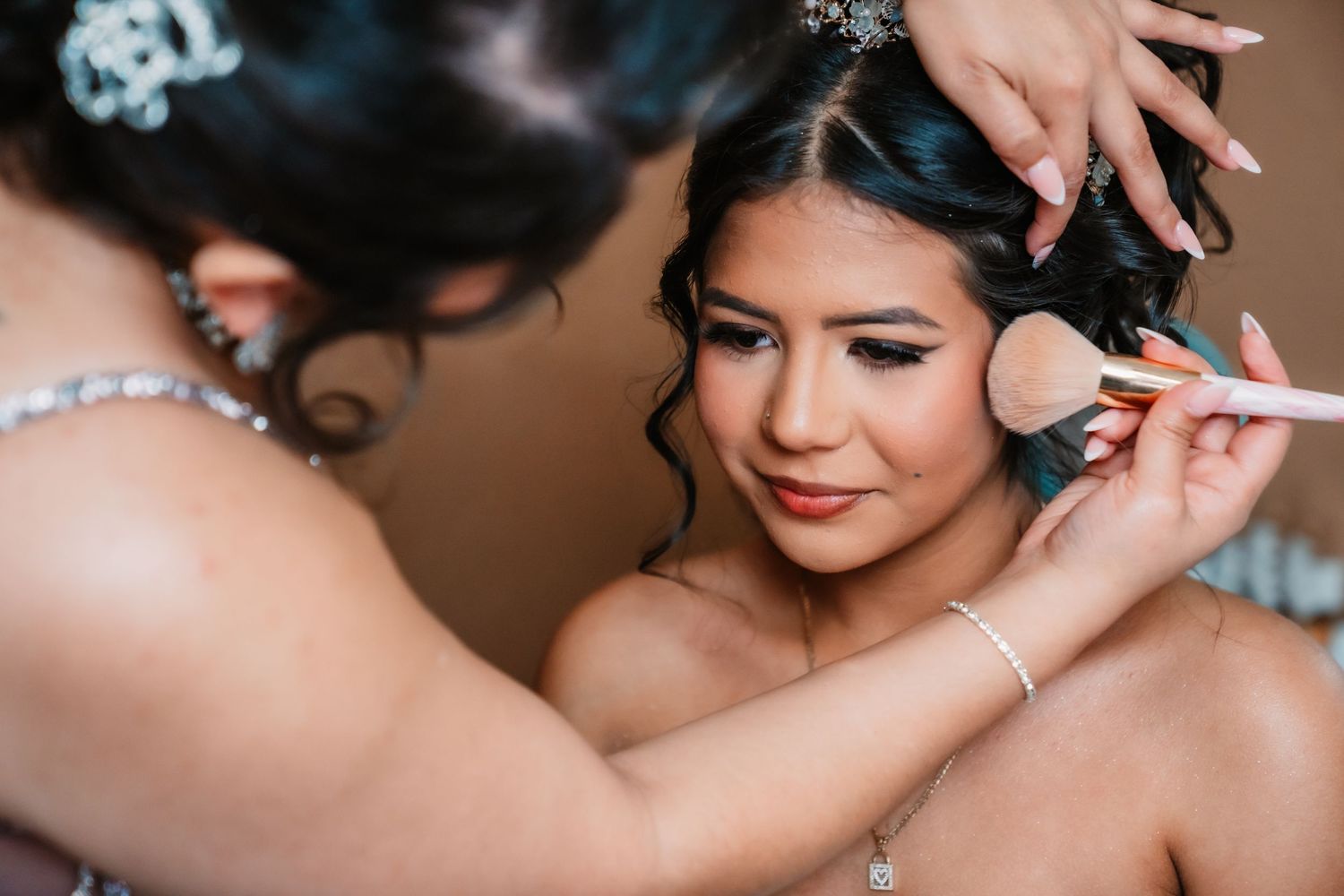 Close-up details of Quinceañera day preparations and jewelry accessories.