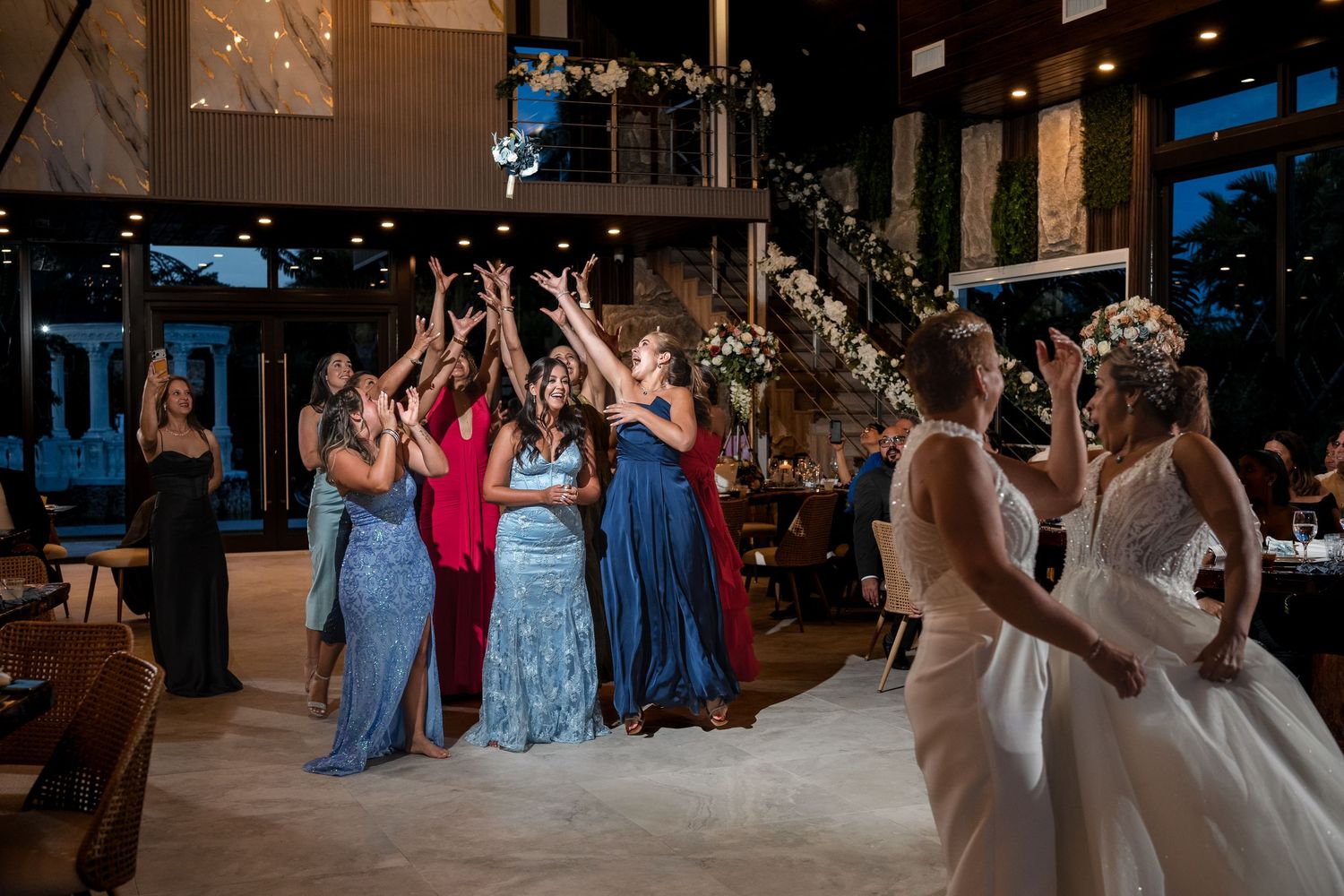Wedding guests celebrating on the dance floor at Little Paradise Farm