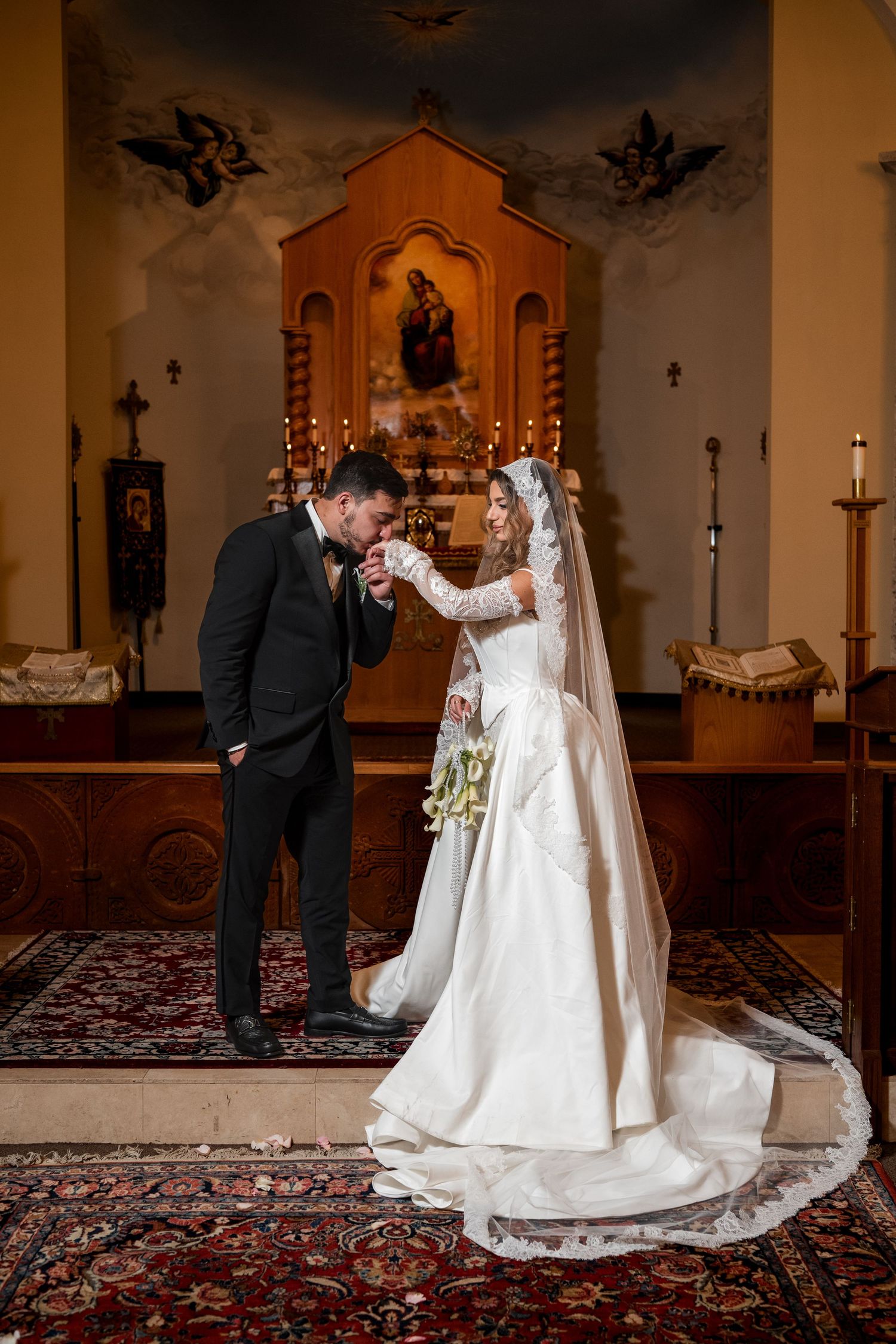 Bride and groom standing together inside a church during an Armenian wedding ceremony