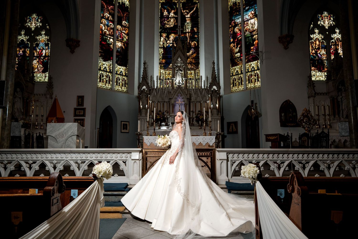 Bride walking through a church aisle during a Jacksonville wedding ceremony