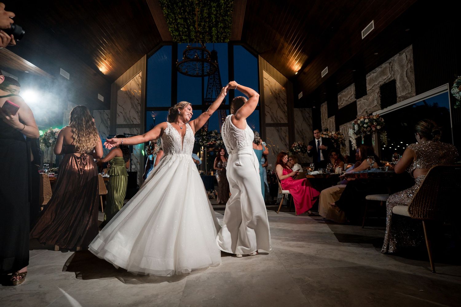 Newlyweds celebrating together on the dance floor at Little Paradise Farm