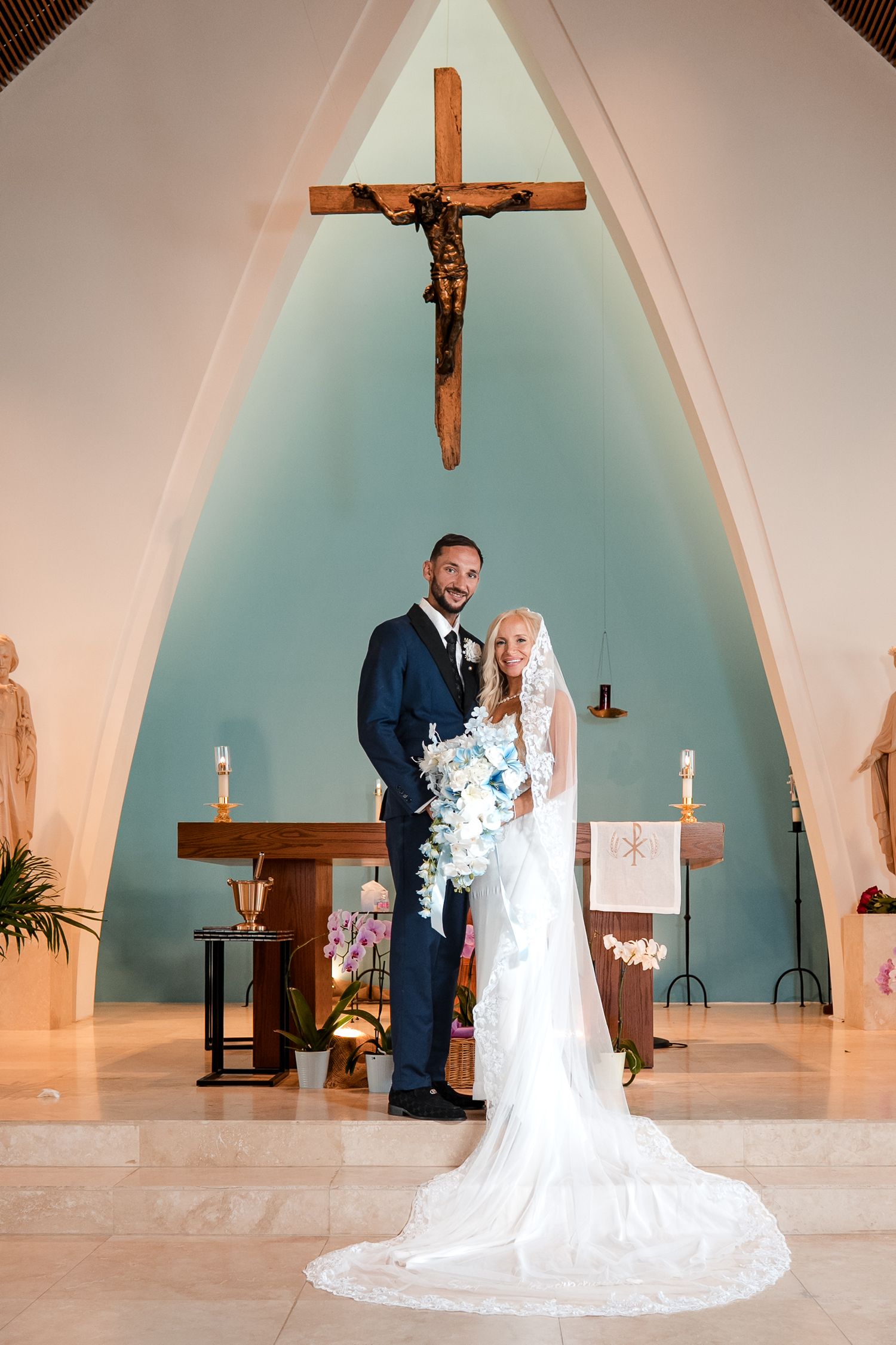 Bride and groom standing at the altar during a Florida Keys church wedding ceremony