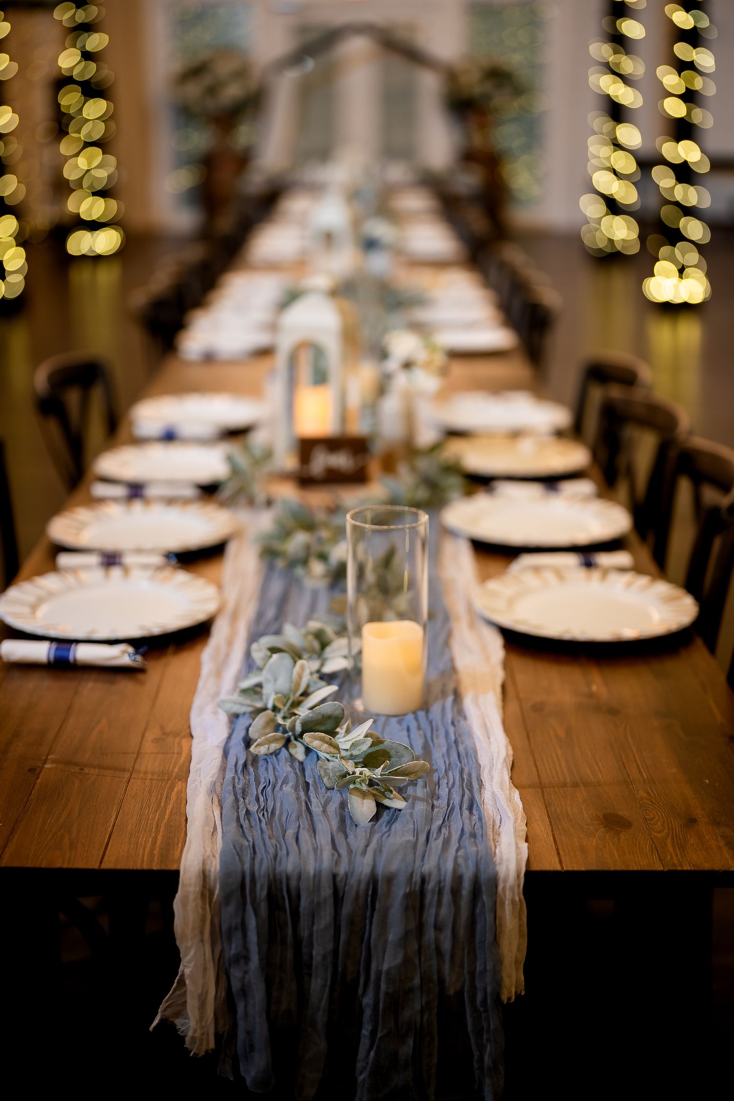 Elegant long-table setup prepared for a Florida wedding reception
