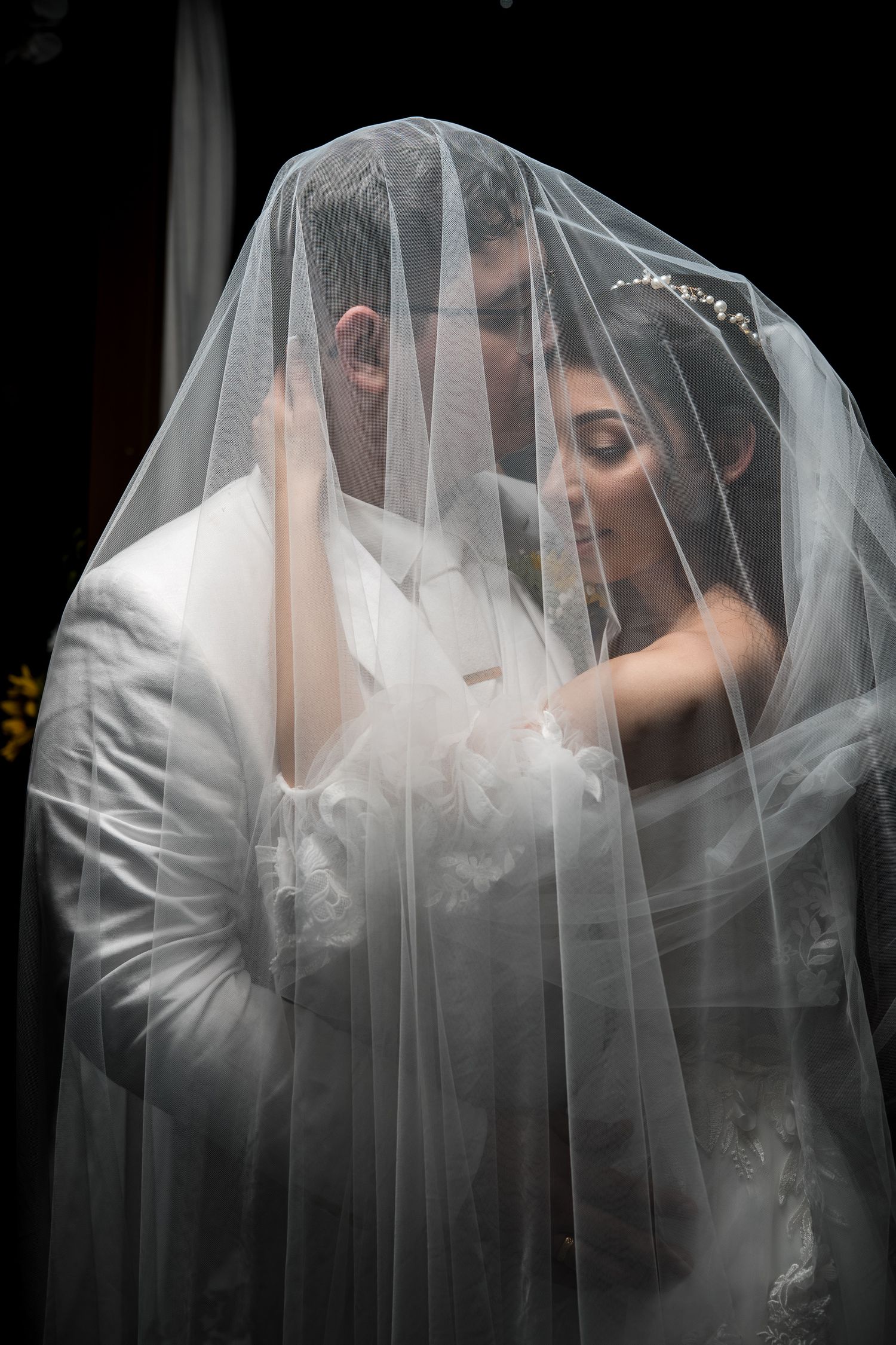 Bride portrait beneath her wedding veil during a Miami wedding