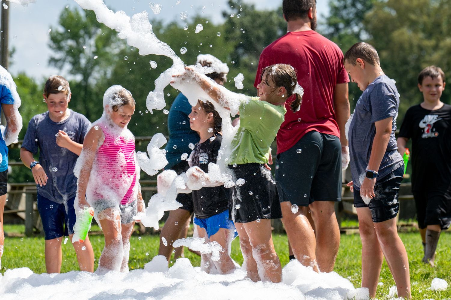 Students laugh and play in foam suds during 2026 Spencer County 4H Fair.