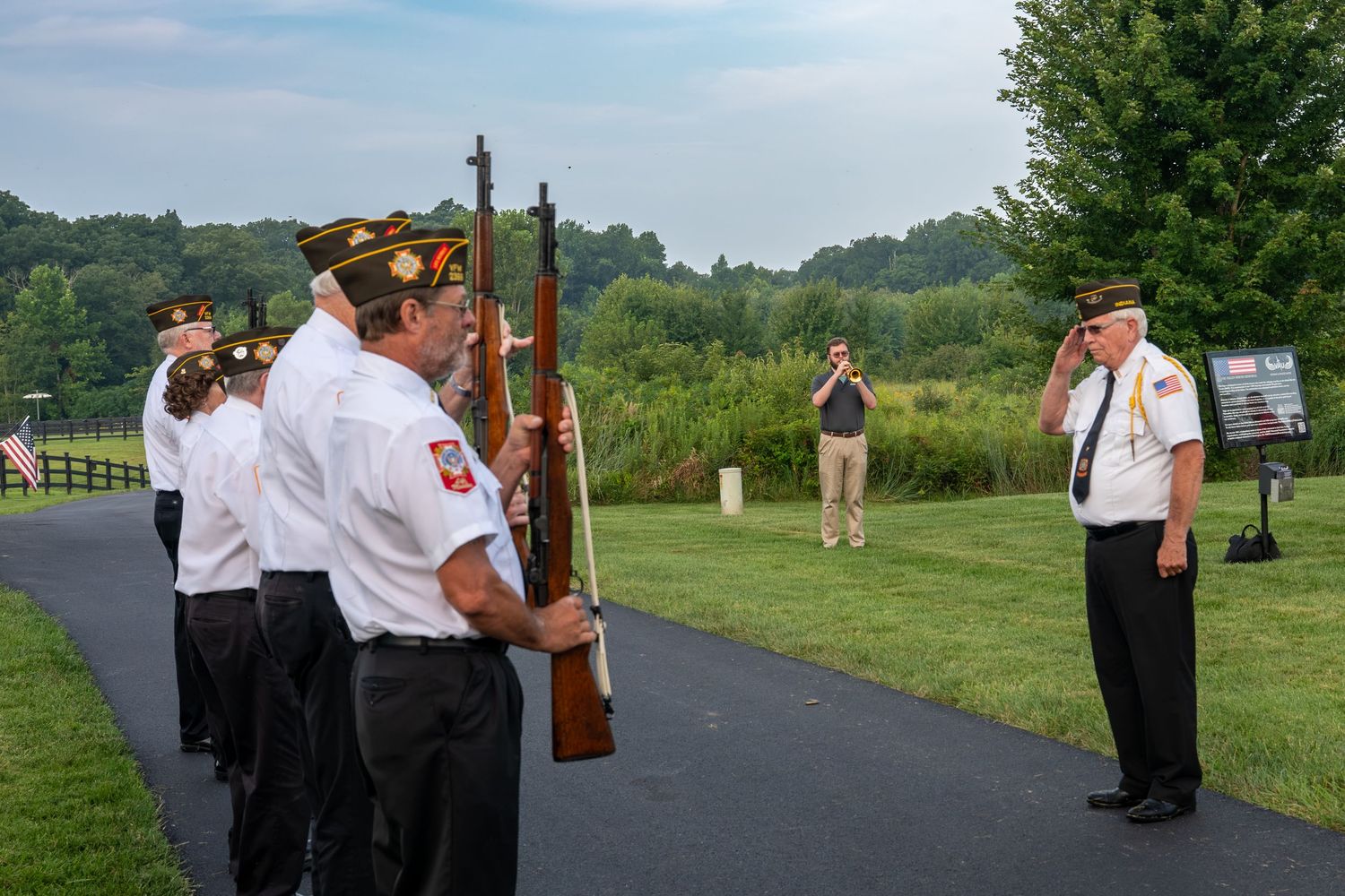American Legion members perform a 21 guns salute during the 2026 Honor and Remember Run at Cool Springs, OFS Brands.