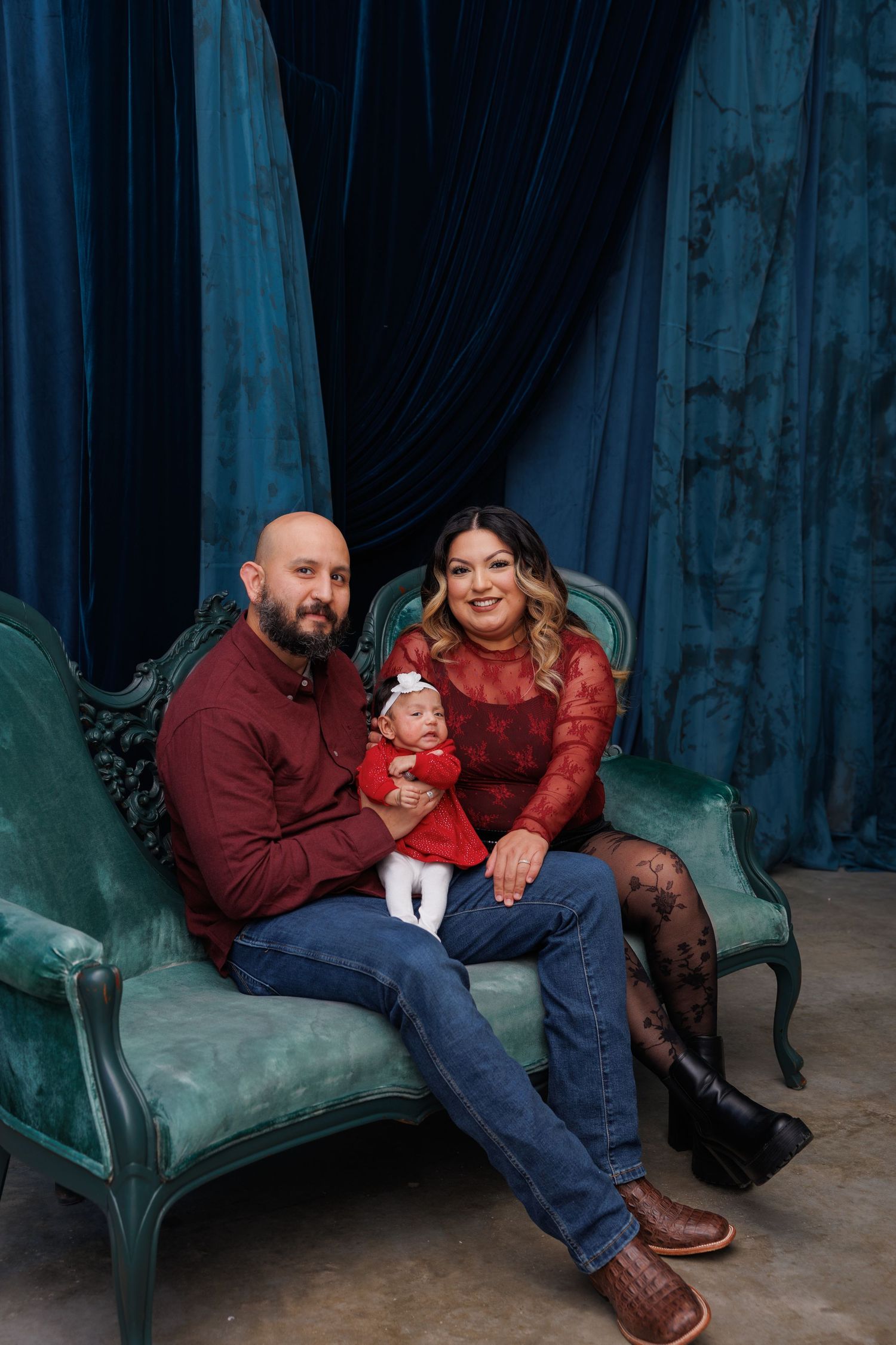 Couple in burgundy and denim sitting on a vintage teal couch in a photo collage sequence.
