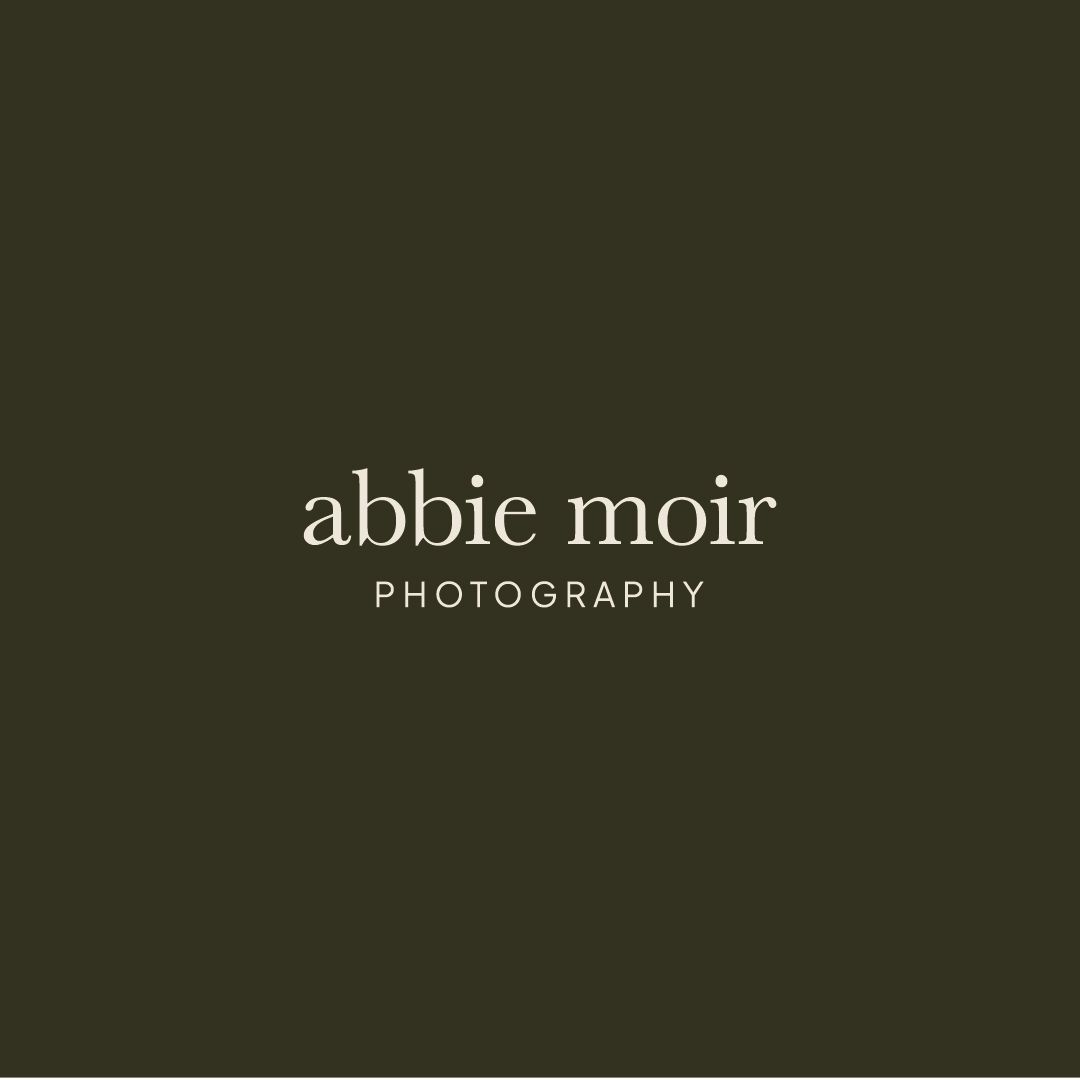 Simple white text logo for Abbie Moir Photography on a dark olive green background.