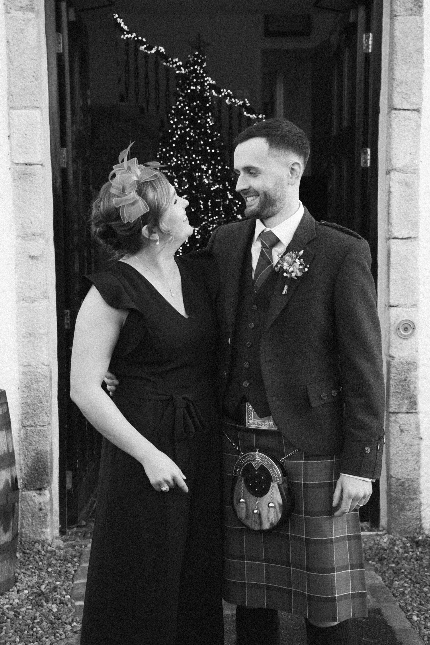 Black and white wedding photos showing guests in traditional Scottish formal wear.
