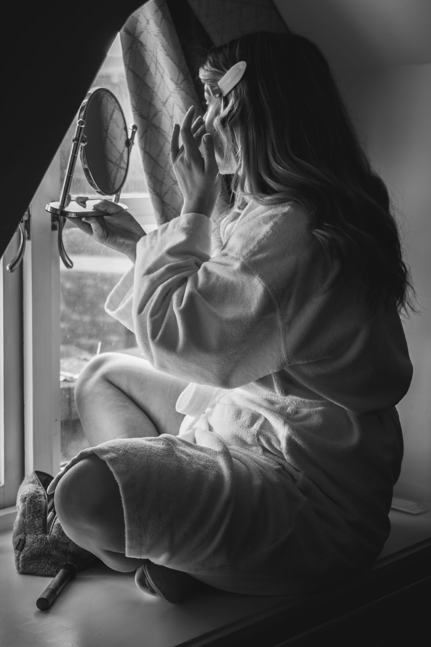 Artistic black and white photo series showing hands holding a steaming cup of coffee in moody lighting.